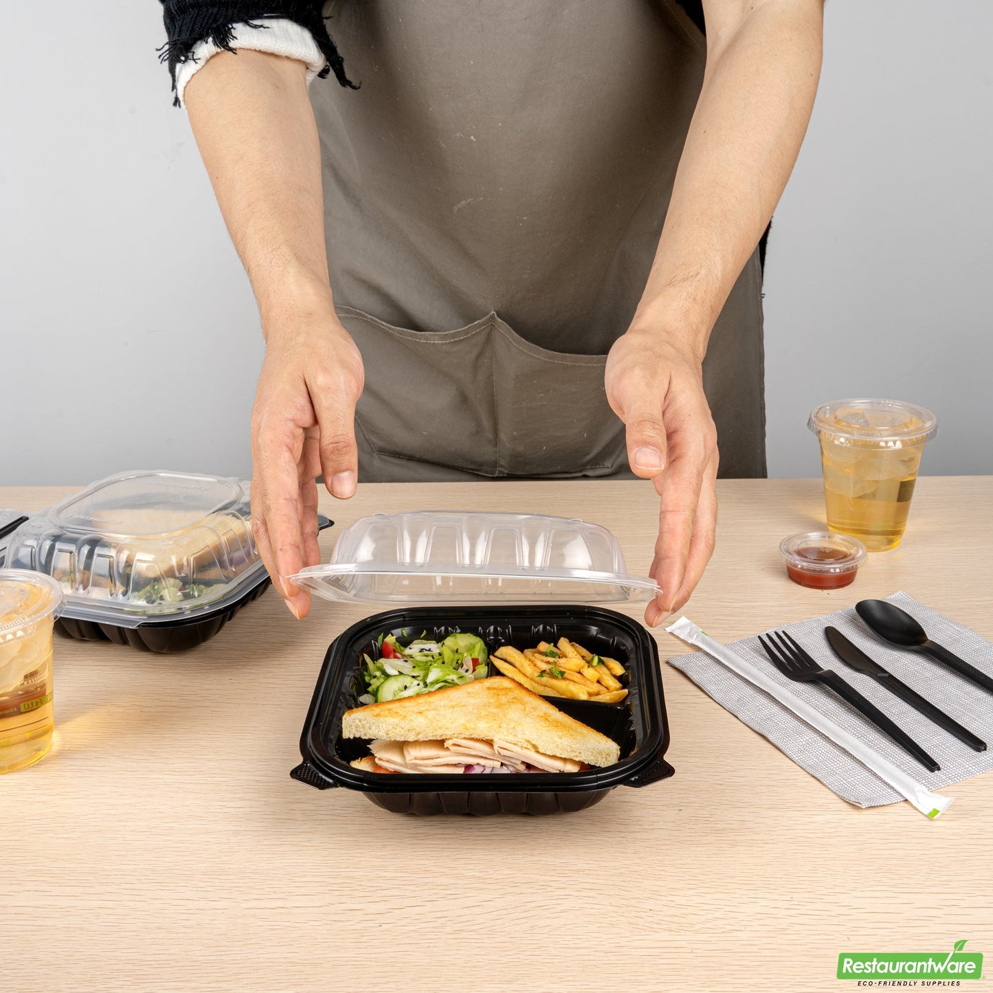 Wholesale Restaurantware 34 Oz Black Plastic Clamshell Container - 3 Compartments- Bulk