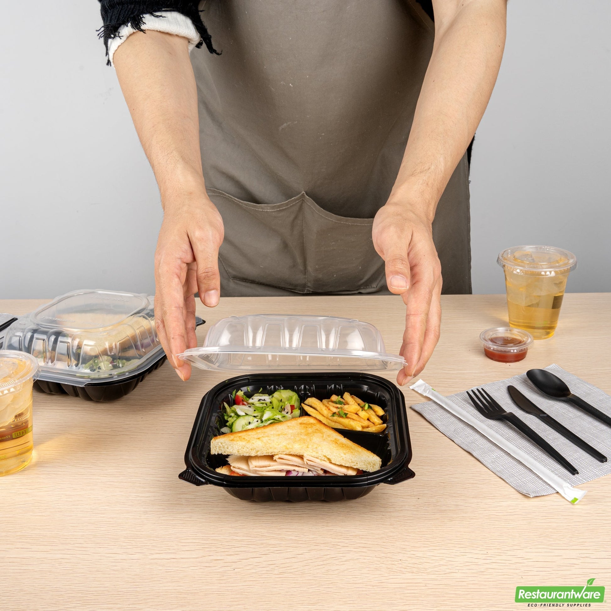 Wholesale Restaurantware 34 Oz Black Plastic Clamshell Container - 3 Compartments- Bulk