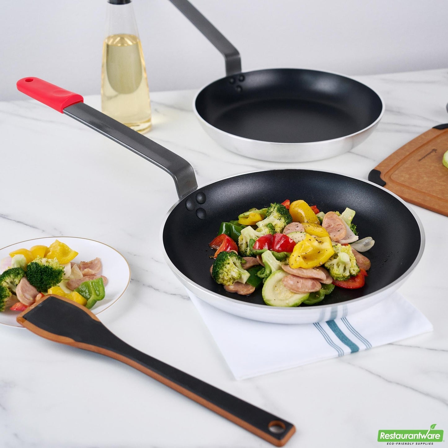 Wholesale Restaurantware Bundle: 1 Aluminum 13" Induction Ready Fry Pan and 1 Red Sleeve- Bulk