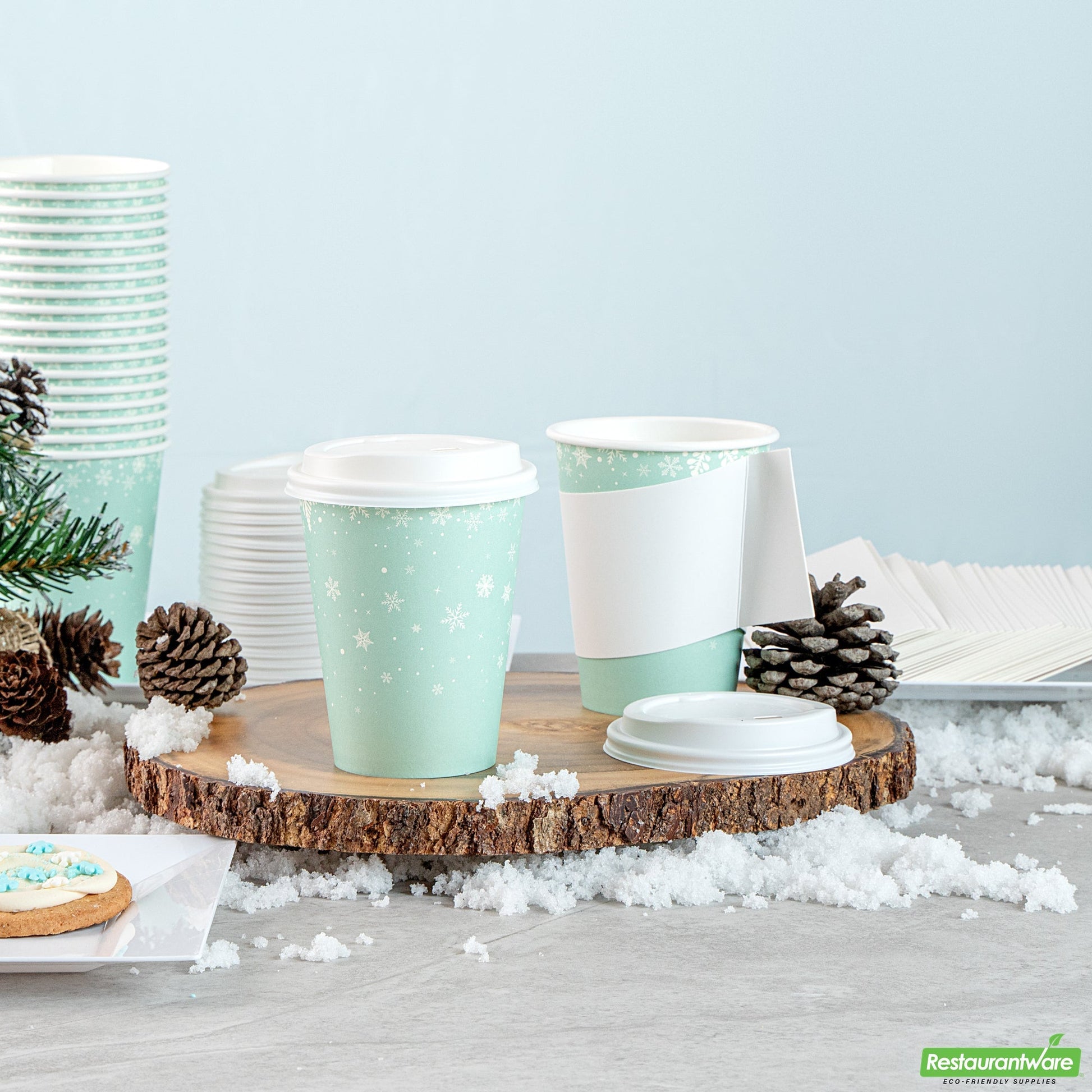 Wholesale Restaurantware Restpresso 12 Oz Blue Christmas Snowflakes Paper Single Wall Coffee Cup - with White Lid - 3 1/2" X 3 1/2" X 4 3/4" - 20 Count Box- Bulk