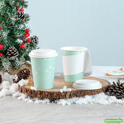 Wholesale Restaurantware Restpresso 12 Oz Blue Christmas Snowflakes Paper Single Wall Coffee Cup - with White Lid - 3 1/2" X 3 1/2" X 4 3/4" - 20 Count Box- Bulk