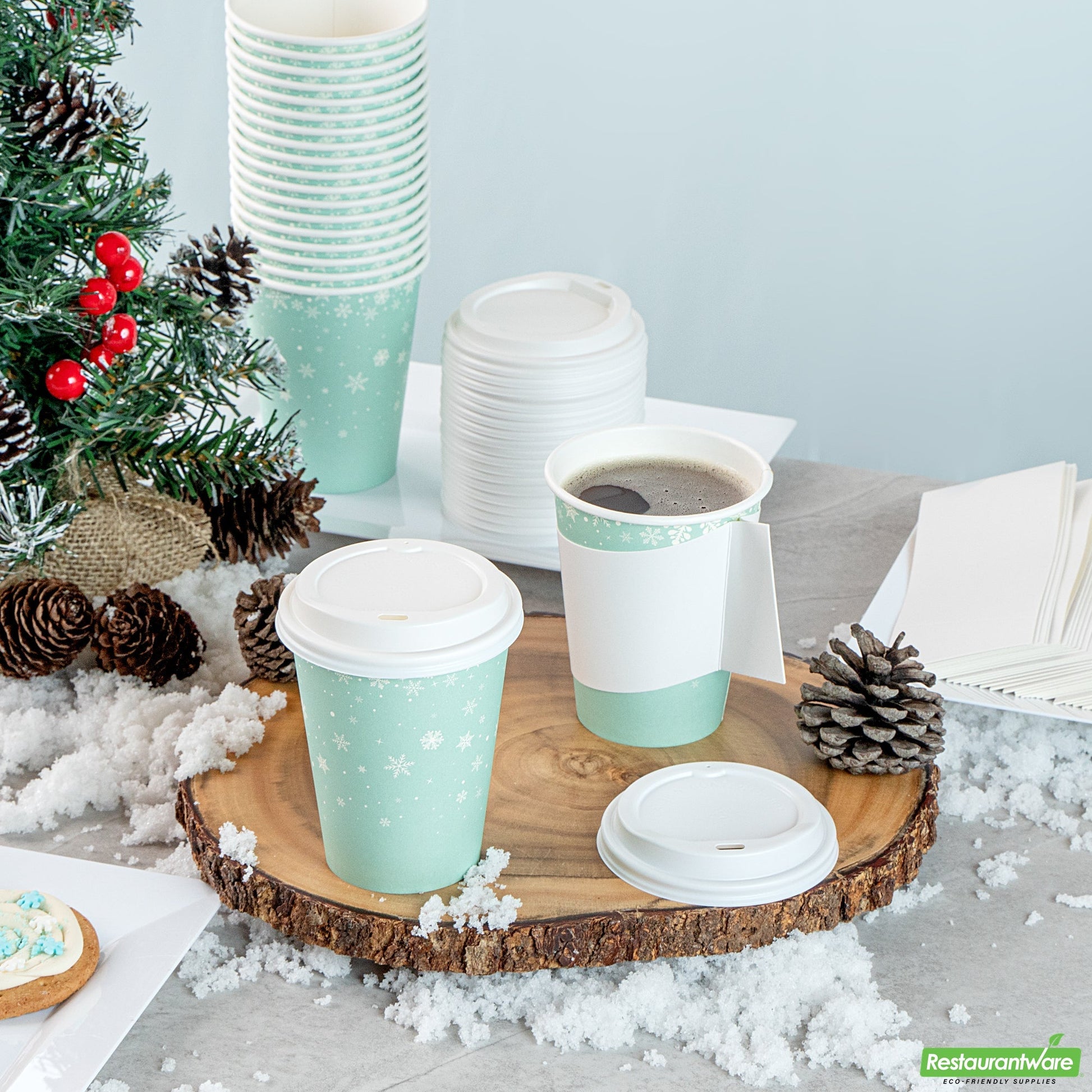 Wholesale Restaurantware Restpresso 12 Oz Blue Christmas Snowflakes Paper Single Wall Coffee Cup - with White Lid - 3 1/2" X 3 1/2" X 4 3/4" - 20 Count Box- Bulk