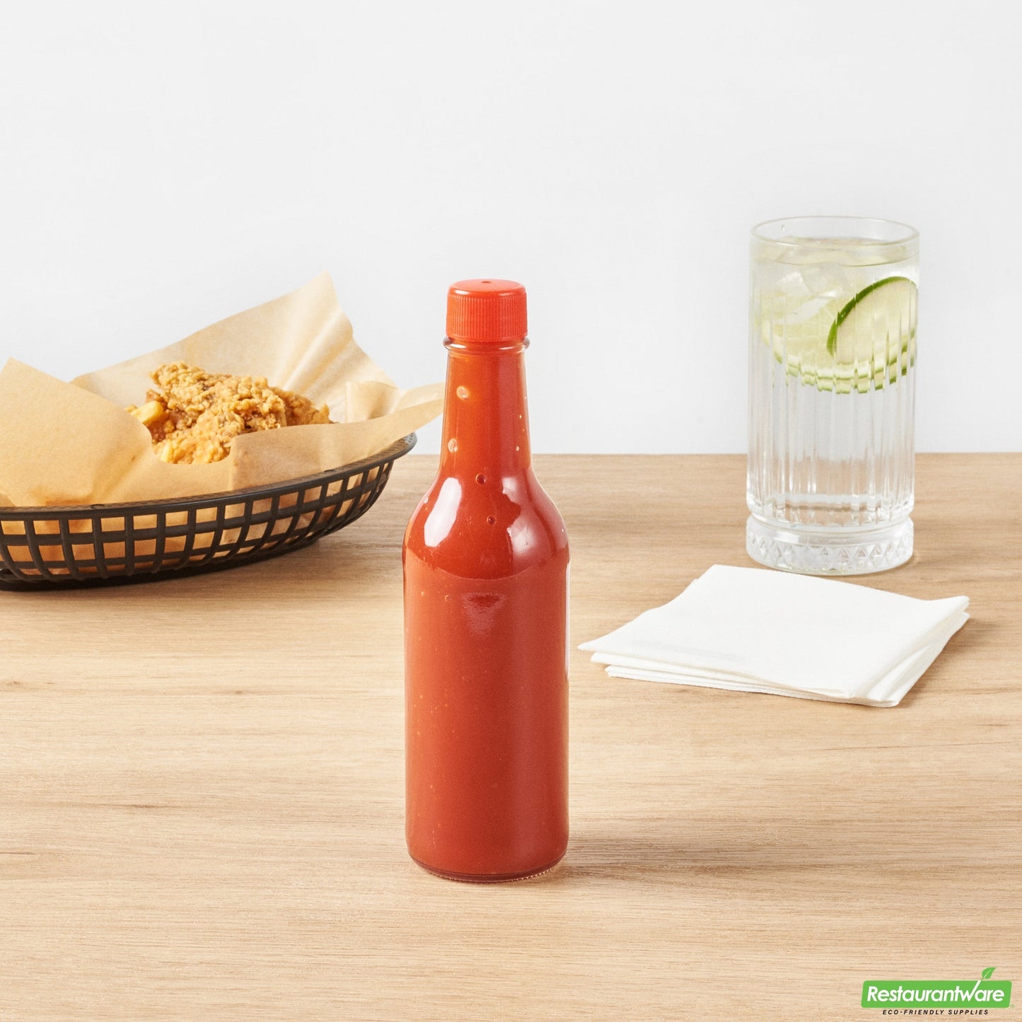 Wholesale Restaurantware Vetri 9 Oz Glass Woozy Bottle - with Red Cap - 2 1/4" X 2 1/4" X 7 3/4" - 10 Count Box- Bulk