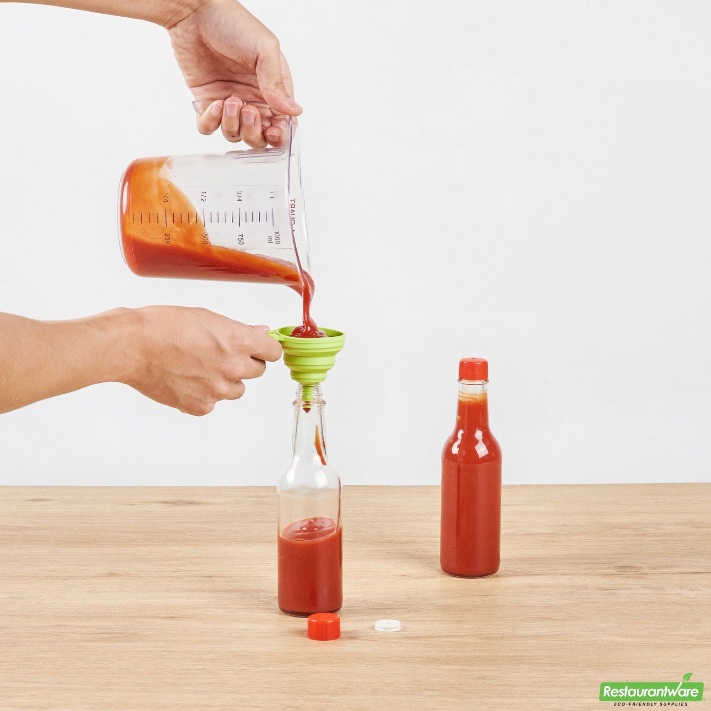 Wholesale Restaurantware Vetri 9 Oz Glass Woozy Bottle - with Red Cap - 2 1/4" X 2 1/4" X 7 3/4" - 10 Count Box- Bulk