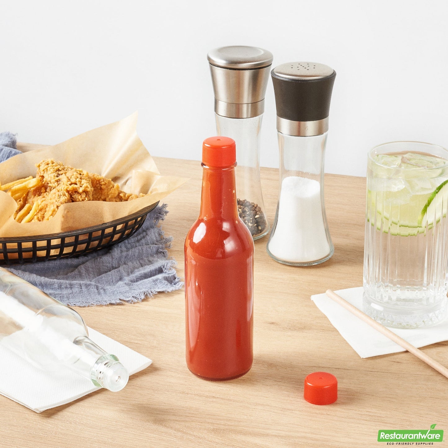 Wholesale Restaurantware Vetri 9 Oz Glass Woozy Bottle - with Red Cap - 2 1/4" X 2 1/4" X 7 3/4" - 10 Count Box- Bulk