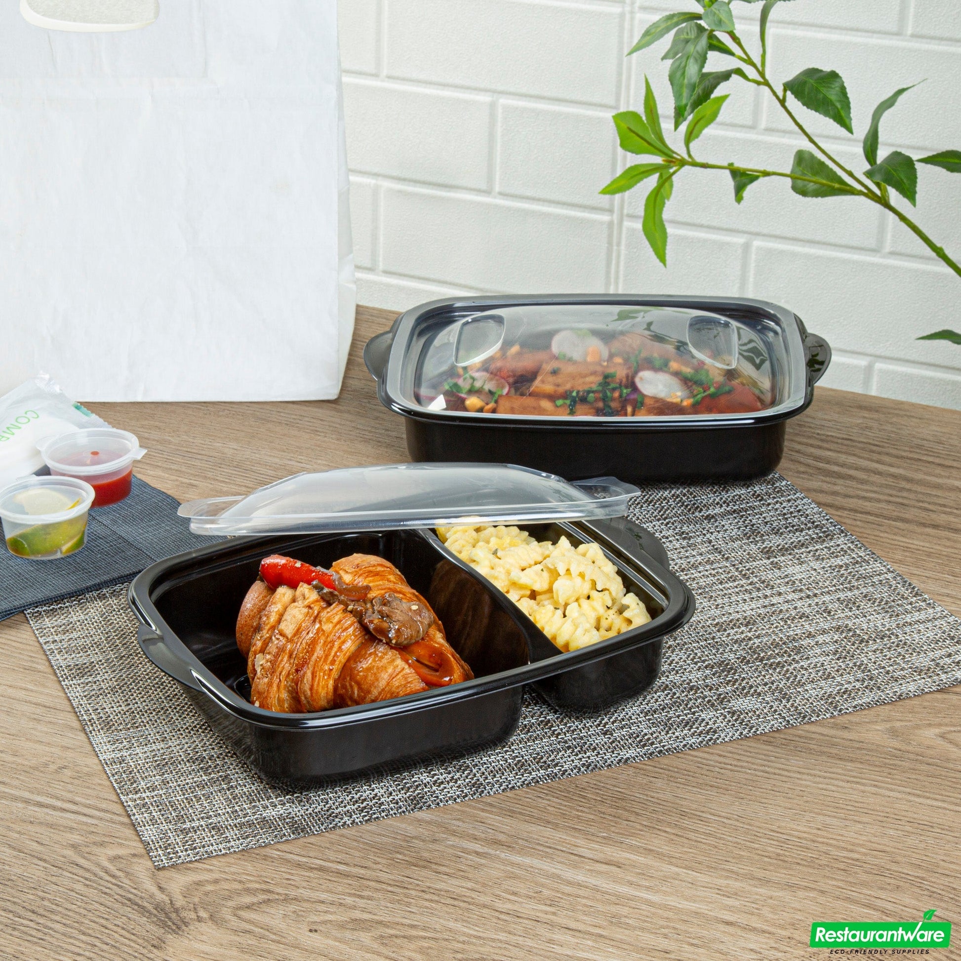 Wholesale Restaurantware 36 Oz Rectangle Black Plastic Food Container - with Clear Lid, Microwavable, 2 Compartments - 8 3/4" X 7" X 2 1/4" - 50 Count Box- Bulk