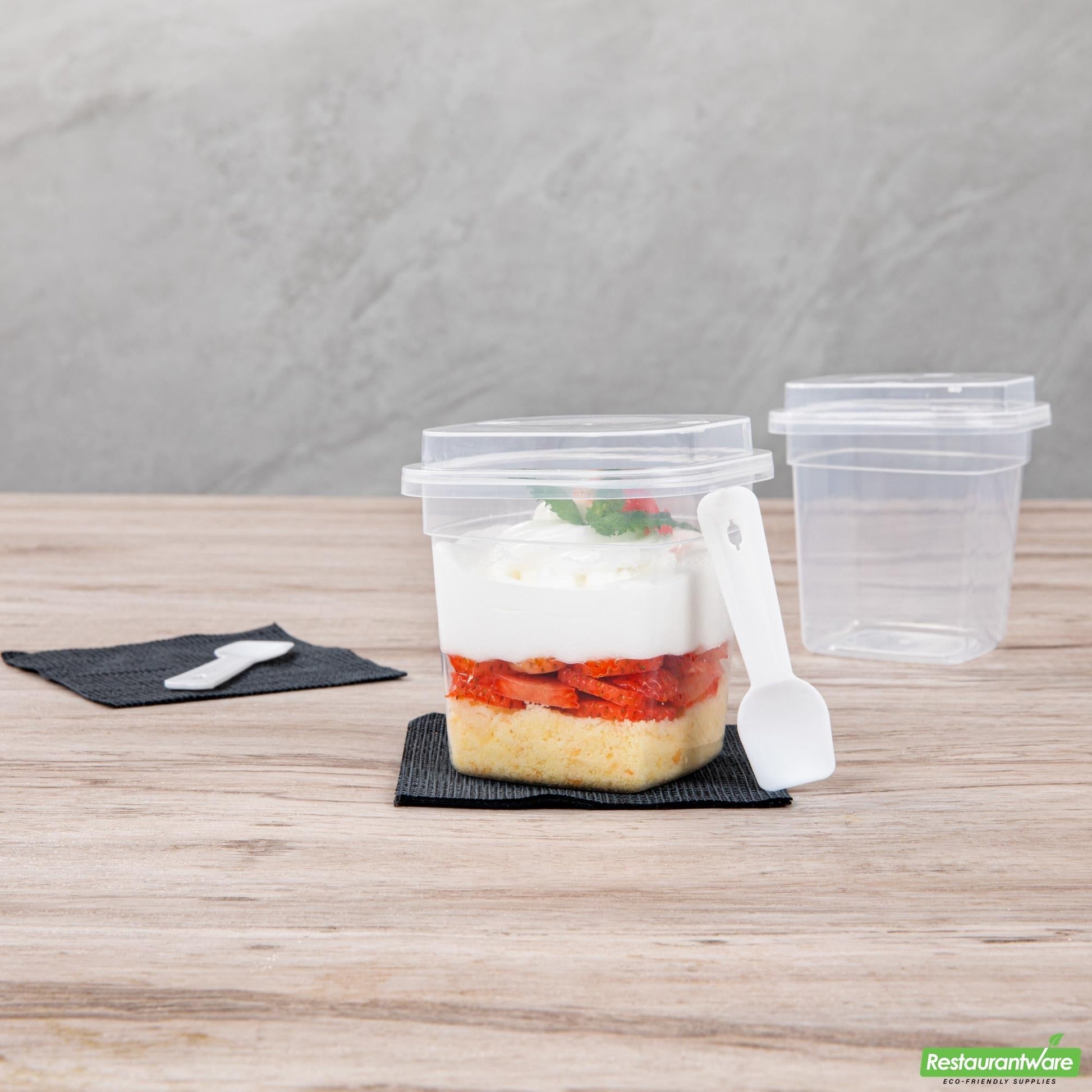 Wholesale Restaurantware Mini Serve 7 Oz Square Clear Plastic Dessert Cup - with Lid and Spoon - 3 1/4'' X 3 1/4'' X 3 1/2'' - 100 Count Box- Bulk