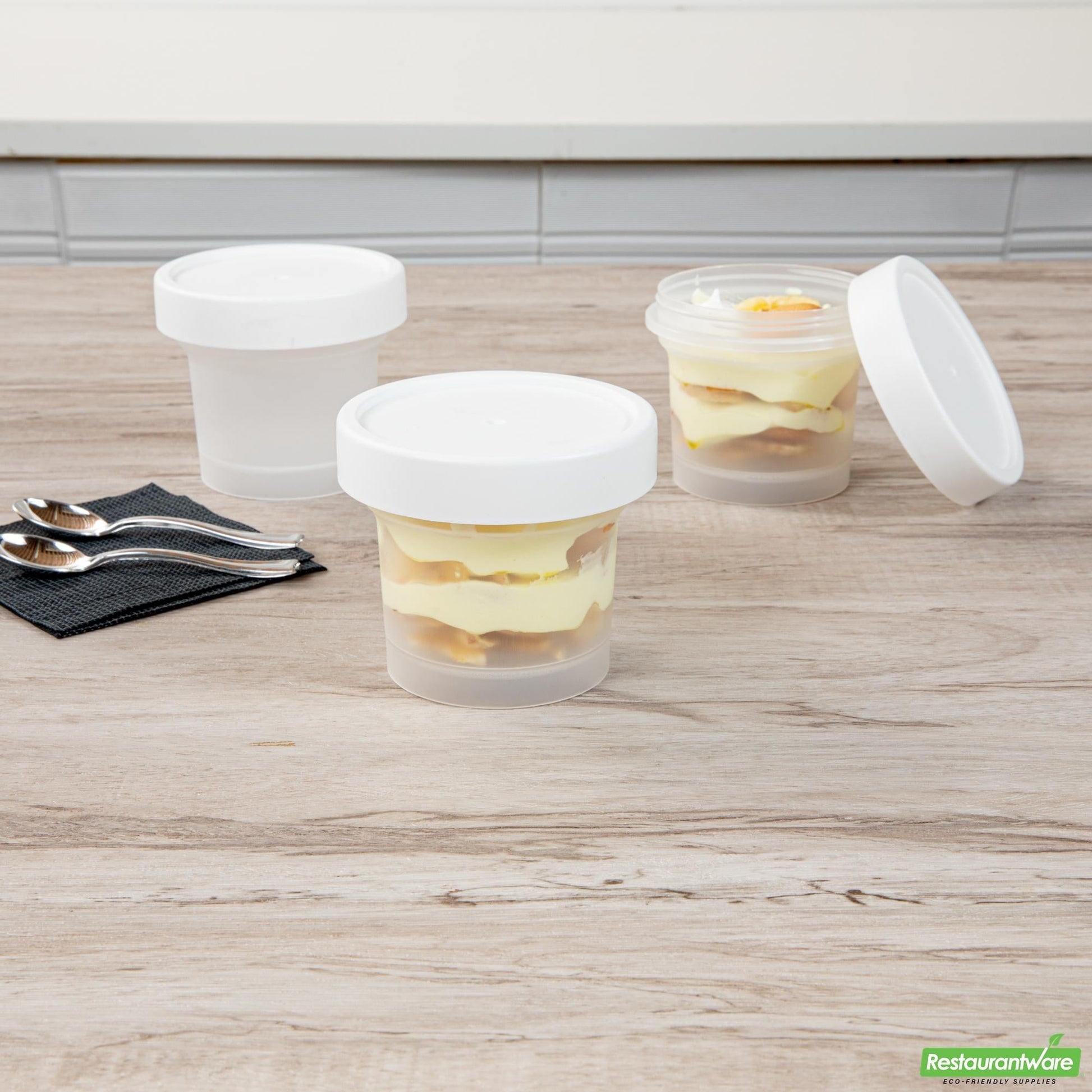 Wholesale Restaurantware Mini Serve 8 Oz Round Clear Plastic Dessert Cup - with Lid - 3 1/2'' X 3 1/2'' X 3'' - 100 Count Box- Bulk