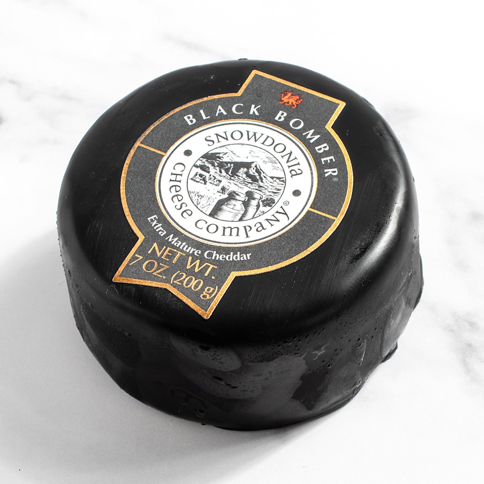 Wholesale Snowdonia Black Bomber Ched Truckle- Bulk