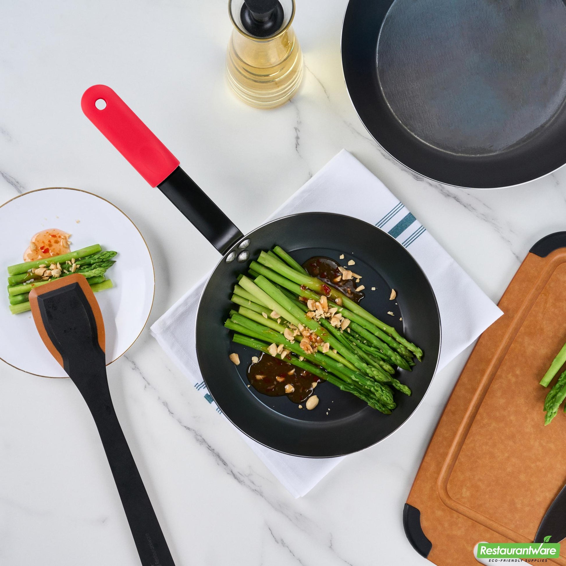 Wholesale Restaurantware Bundle: 1 Black Carbon Steel 9 1/2" Pre-Seasoned Fry Pan and 1 Sleeve- Bulk