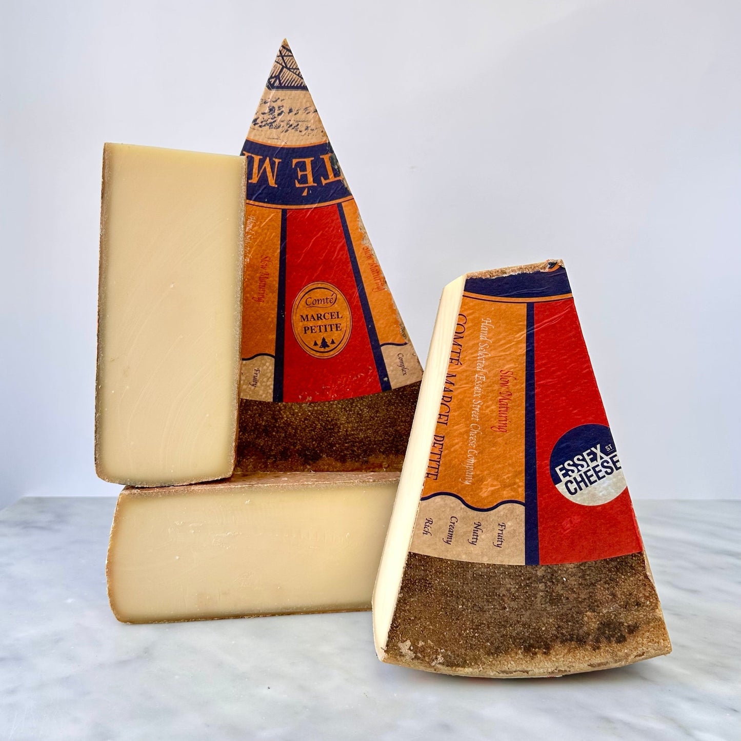 Wholesale Marcel Petite Comté Cheese Quarters 20 LB- Bulk