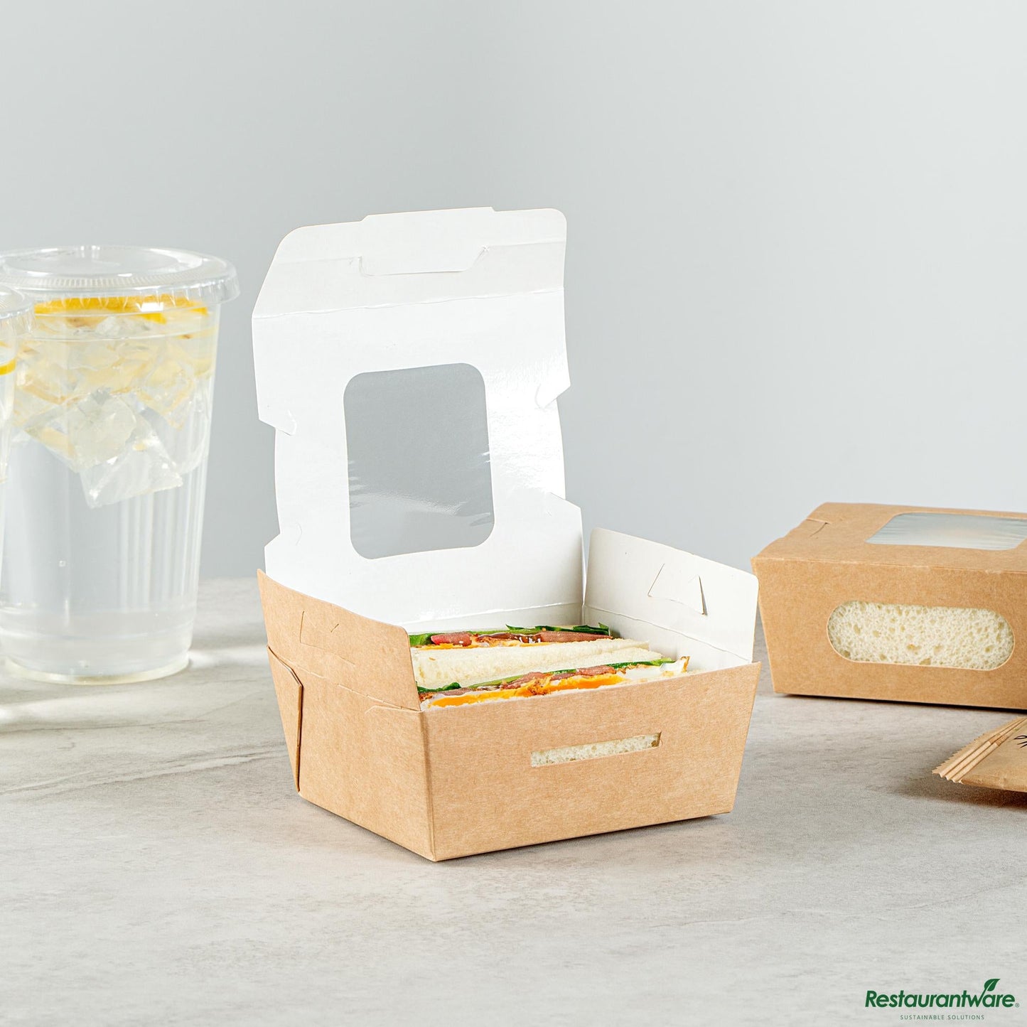 Wholesale Restaurantware Cafe Vision 12 Oz Rectangle Kraft Paper Mini Bio Lunch Box - Two Windows - 4 1/4" X 3 3/4" X 1 3/4"- Bulk