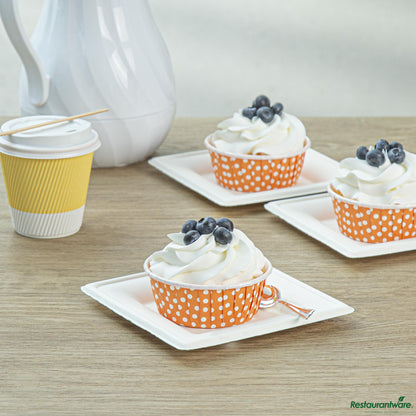 Wholesale Restaurantware Panificio 5 Oz Round Polka-Dotted Hot Orange Paper Large Baking Cup - Pleated - 3 3/4" X 3 3/4" X 1 1/2"- Bulk