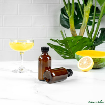 Wholesale Restaurantware 2 Oz Boston Round Amber Glass Bottle - with Black Phenolic Cap - 1.5" X 1.5" X 3.7"- Bulk