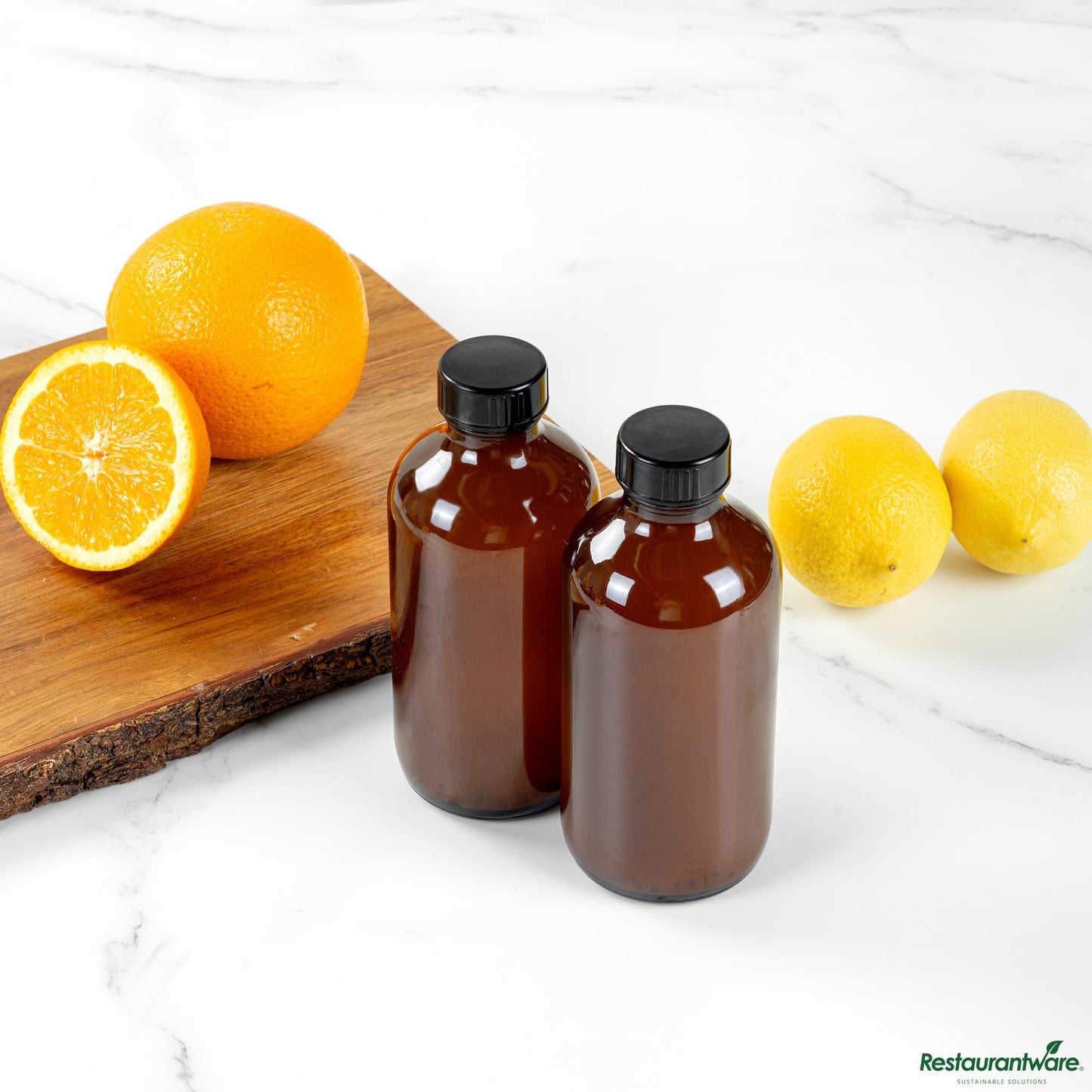Restaurantware 8 Oz Boston Round Amber Glass Bottle - with Black Phenolic Cap - 2.4" X 2.4" X 5.4"