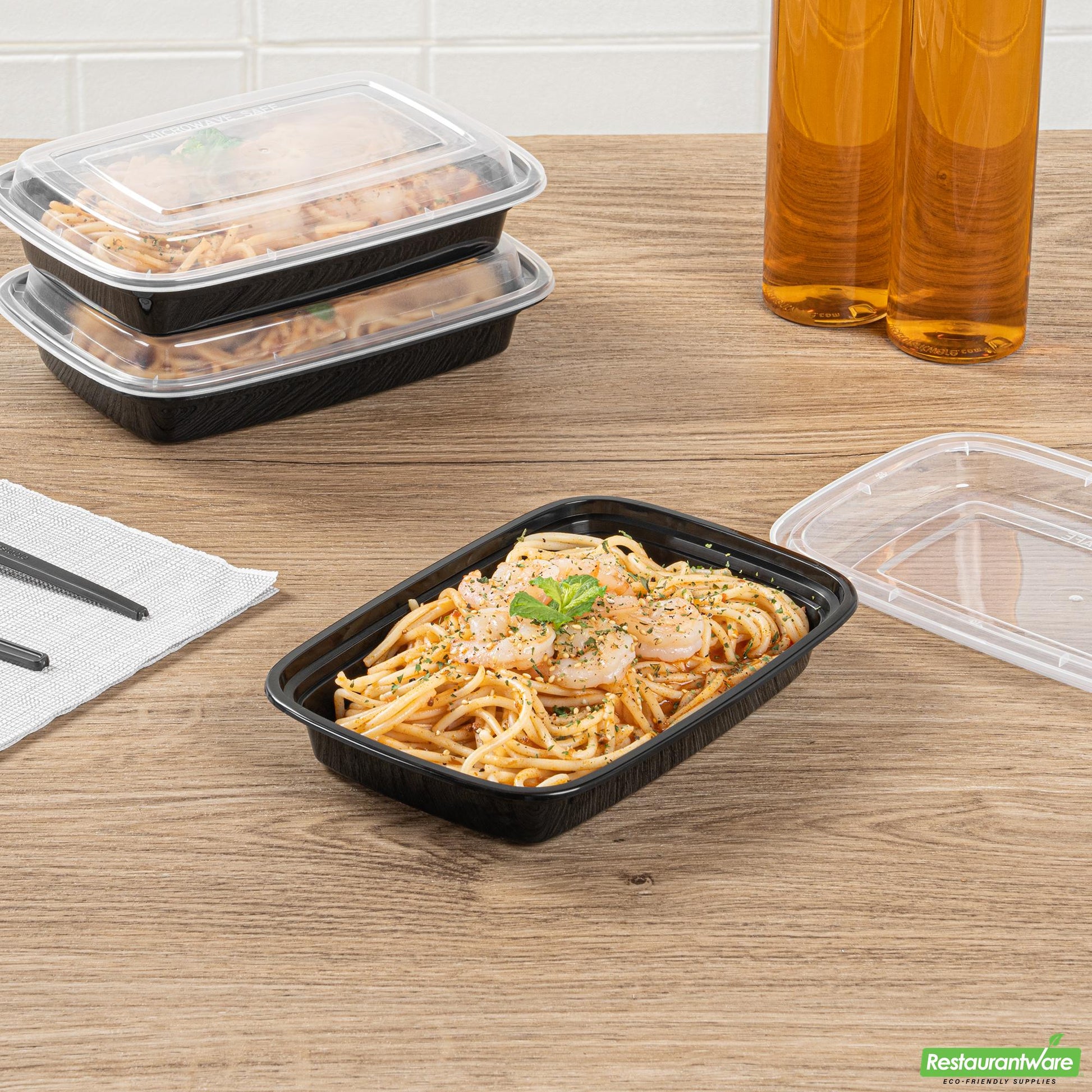 Wholesale Restaurantware Asporto 16 Oz Rectangle Black Plastic to Go Box - with Clear Lid, Microwavable - 7 3/4" X 5 1/2" X 1 1/2"- Bulk