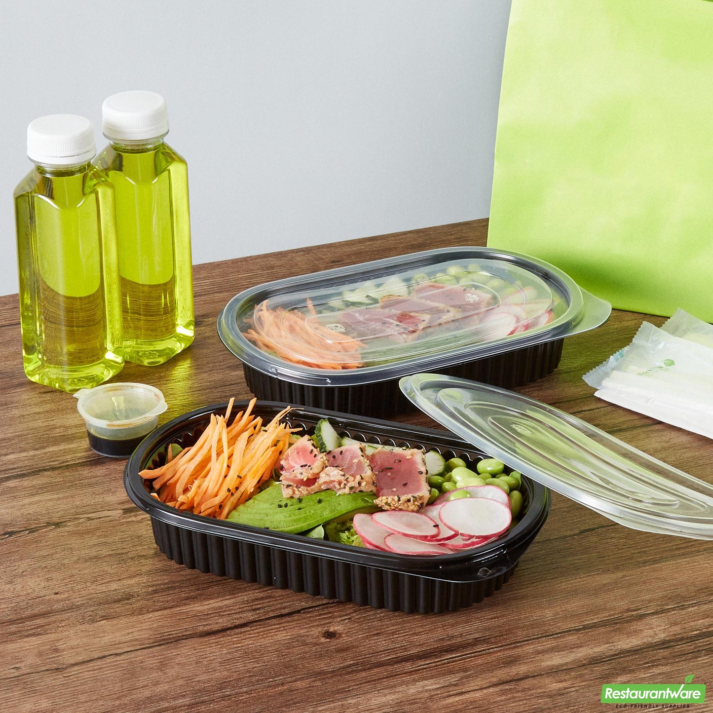Wholesale Restaurantware 25 Oz Oval Black Plastic Food Container - with Clear Flat Lid- Bulk