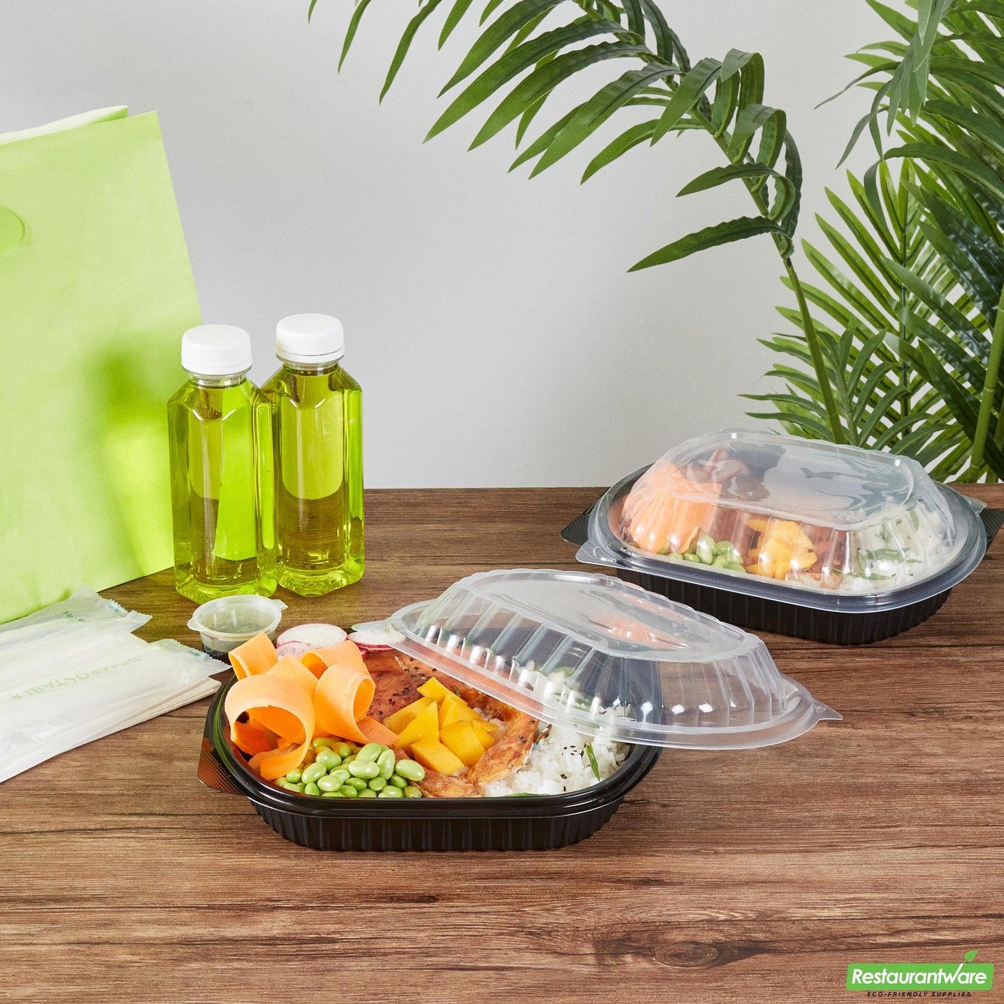 Wholesale Restaurantware 34 Oz Oval Black Plastic Food Container - with Clear Lid- Bulk