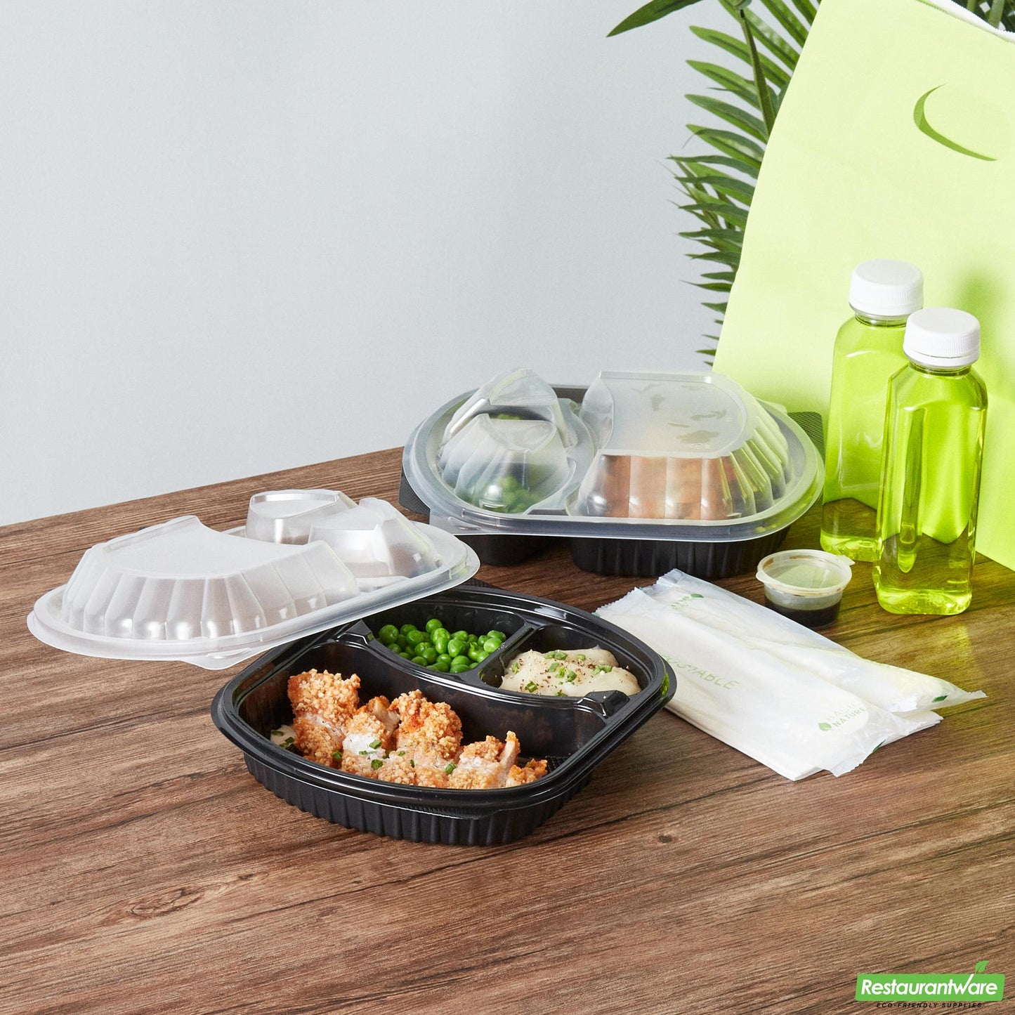 Wholesale Restaurantware 27 Oz Oval Black Plastic Food Container - with Clear Lid- Bulk
