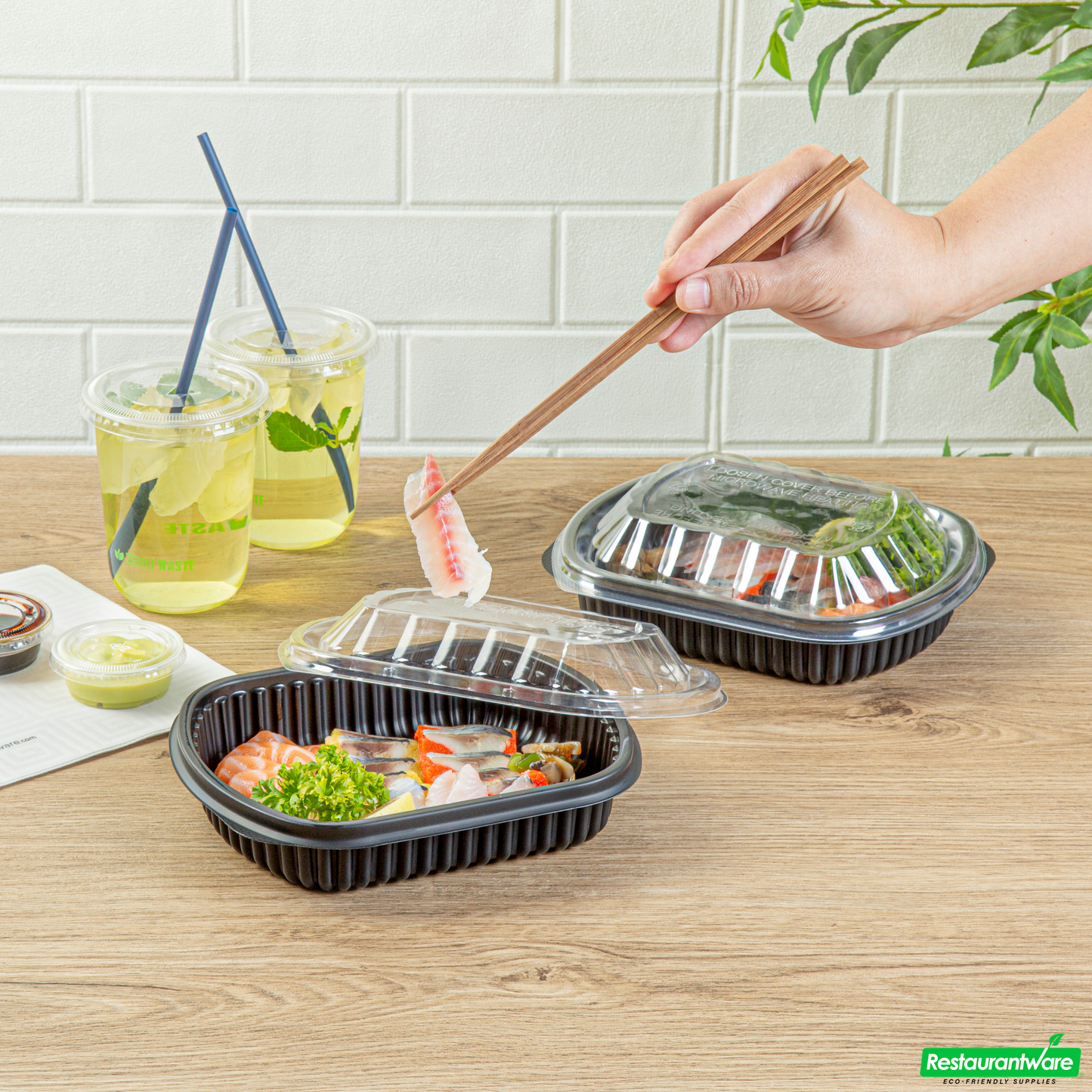 Wholesale Restaurantware 24 Oz Rectangle Black Plastic Food Container - with Clear Lid, Microwavable - 7 3/4" X 6 1/4" X 2 1/4" - 50 Count Box- Bulk