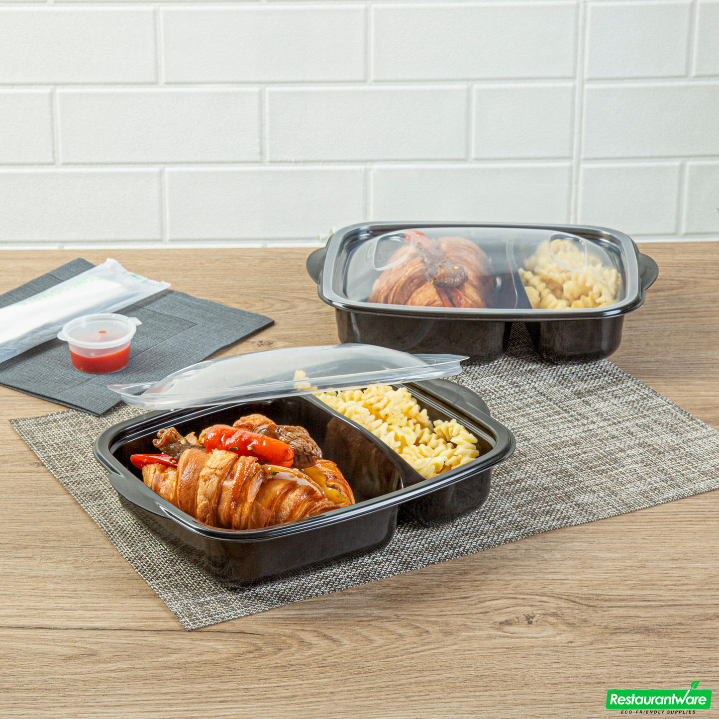 Wholesale Restaurantware 36 Oz Rectangle Black Plastic Food Container - with Clear Lid, Microwavable, 2 Compartments - 8 3/4" X 7" X 2 1/4" - 100 Count Box- Bulk