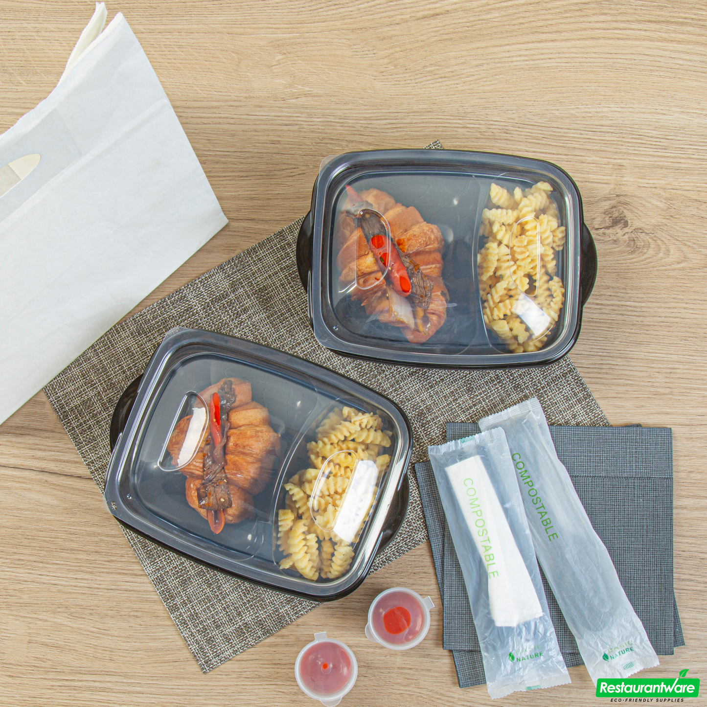 Wholesale Restaurantware 36 Oz Rectangle Black Plastic Food Container - with Clear Lid, Microwavable, 2 Compartments - 8 3/4" X 7" X 2 1/4" - 100 Count Box- Bulk