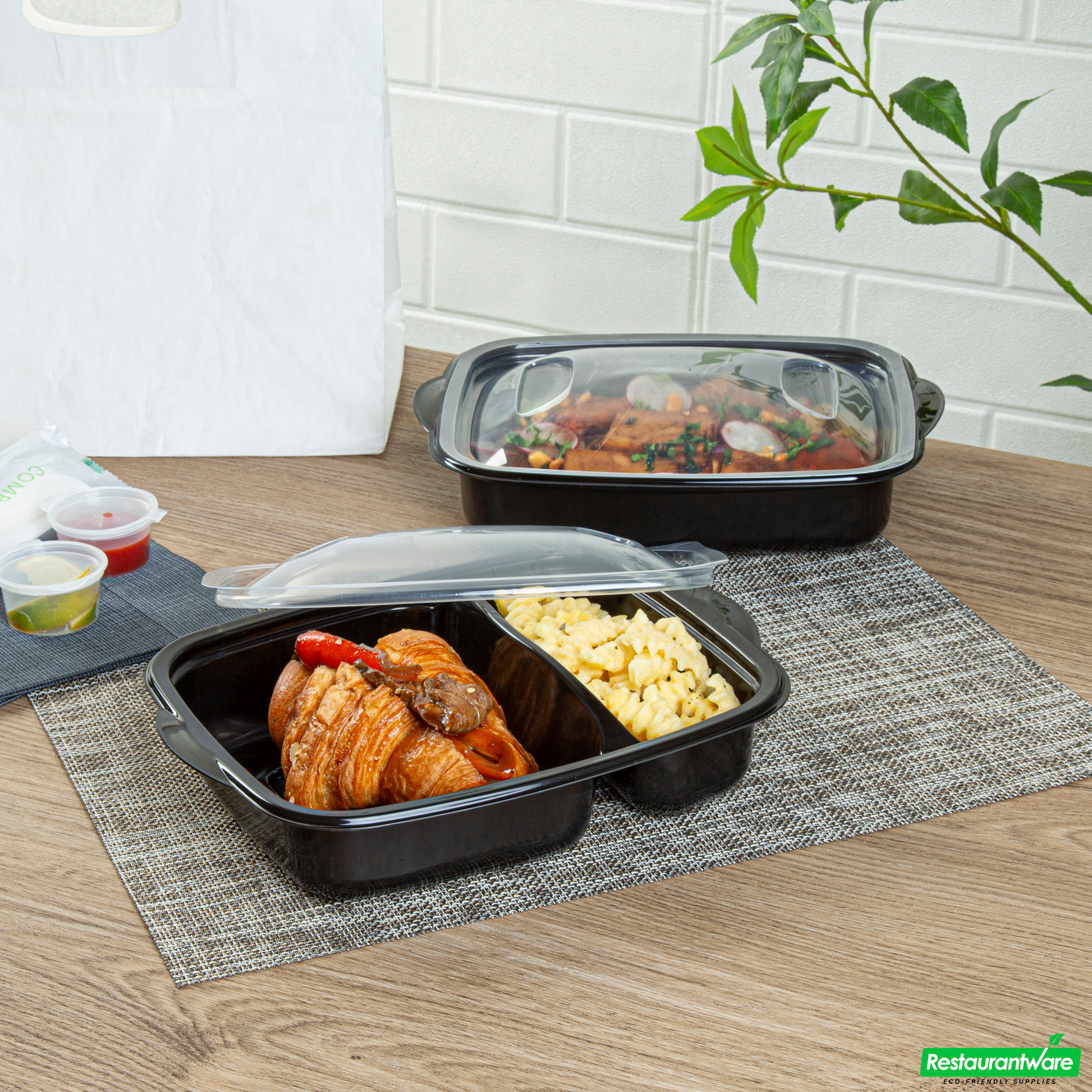 Wholesale Restaurantware 36 Oz Rectangle Black Plastic Food Container - with Clear Lid, Microwavable, 2 Compartments - 8 3/4" X 7" X 2 1/4" - 100 Count Box- Bulk