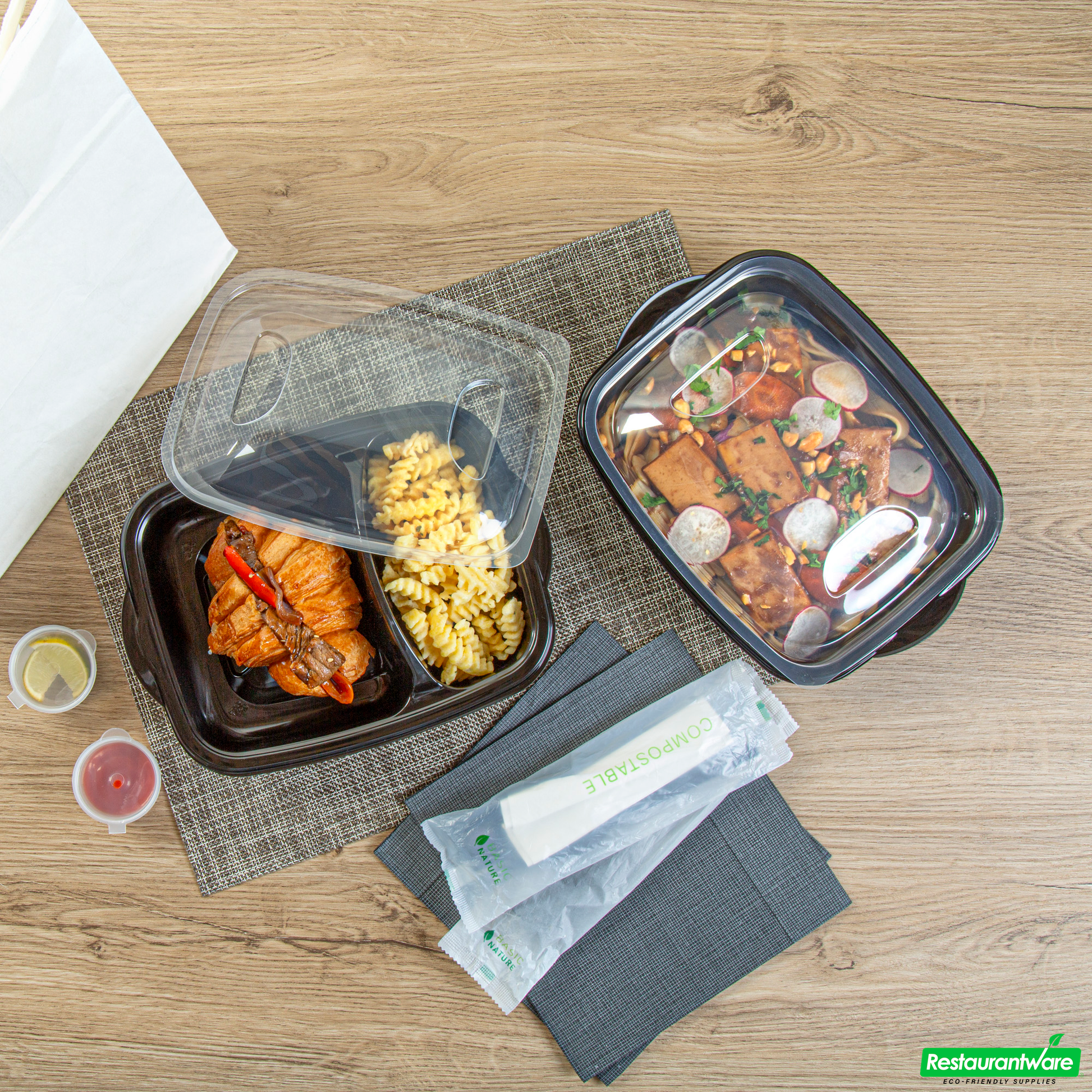 Wholesale Restaurantware 36 Oz Rectangle Black Plastic Food Container - with Clear Lid, Microwavable, 2 Compartments - 8 3/4" X 7" X 2 1/4" - 100 Count Box- Bulk