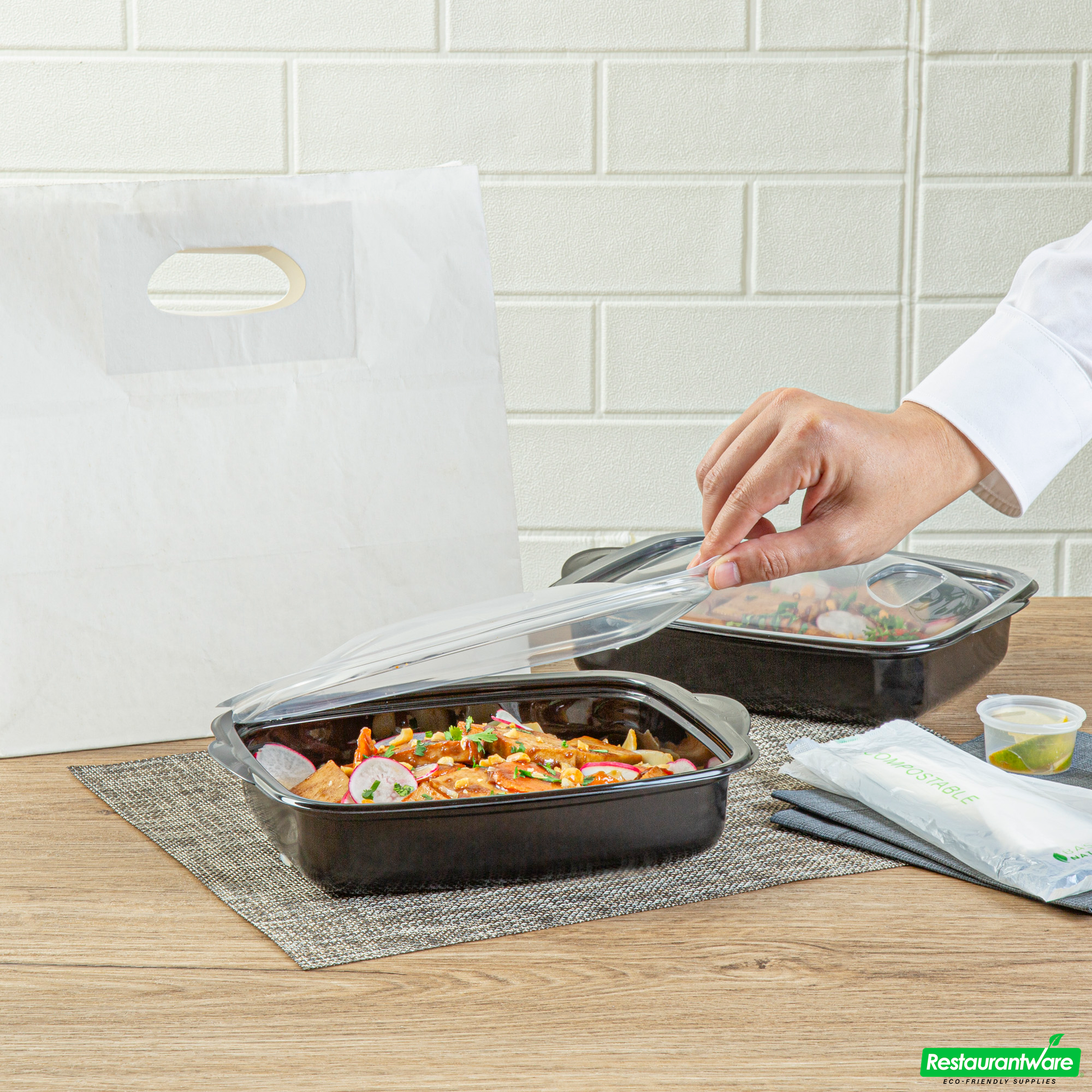Wholesale Restaurantware 36 Oz Rectangle Black Plastic Food Container - with Clear Lid, Microwavable - 8 3/4" X 7" X 2 1/4" - 100 Count Box- Bulk