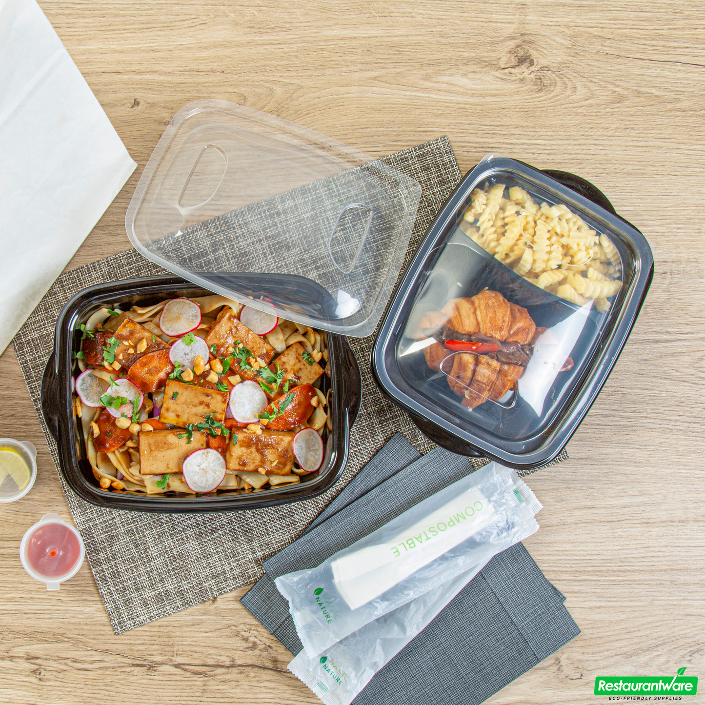 Wholesale Restaurantware 36 Oz Rectangle Black Plastic Food Container - with Clear Lid, Microwavable - 8 3/4" X 7" X 2 1/4" - 100 Count Box- Bulk