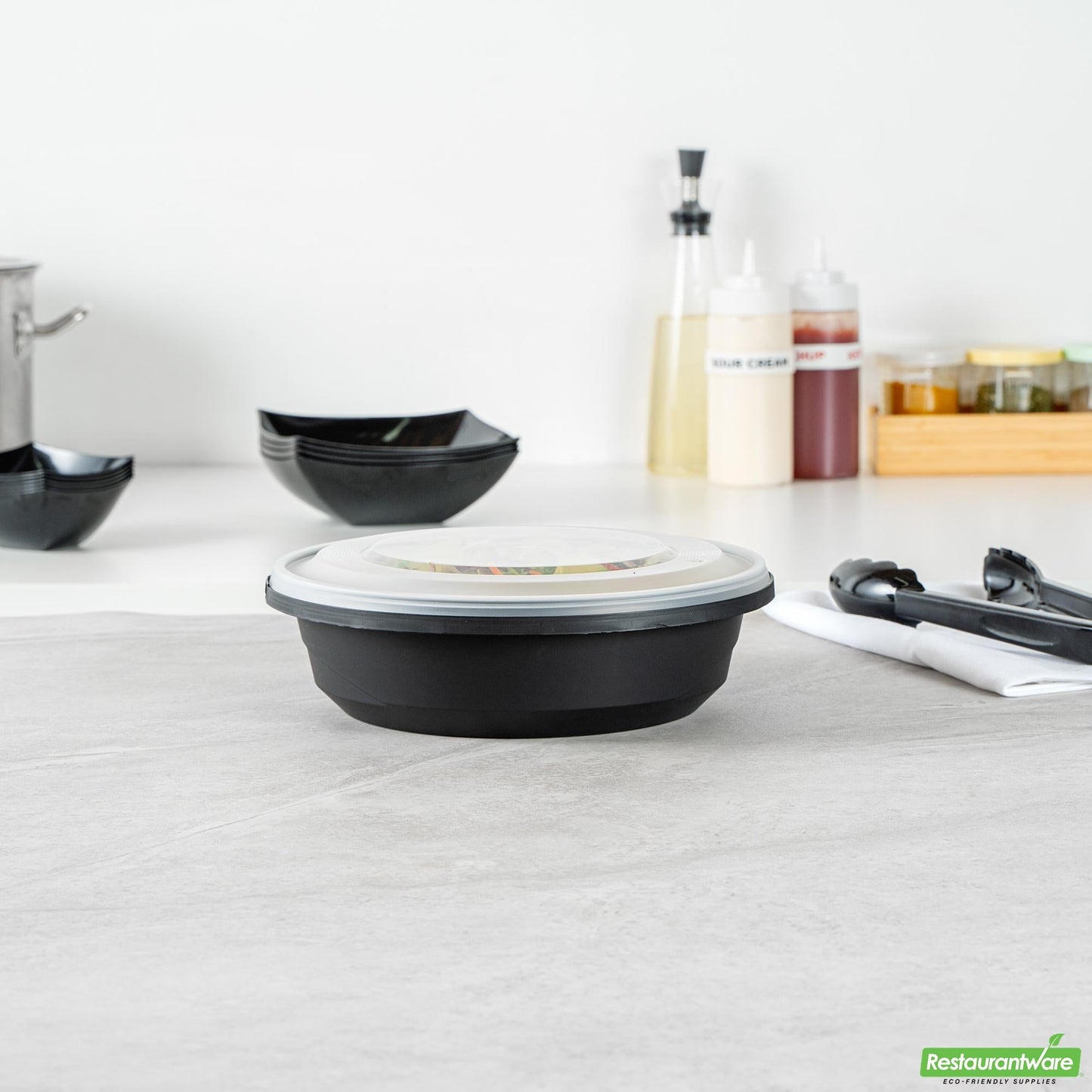 Wholesale Restaurantware Cater Tek 68 Oz Round Black Plastic Catering / Serving Bowl - with Clear Lid, Microwavable - 9 3/4" X 9 3/4" X 3" - 100 Count Box- Bulk