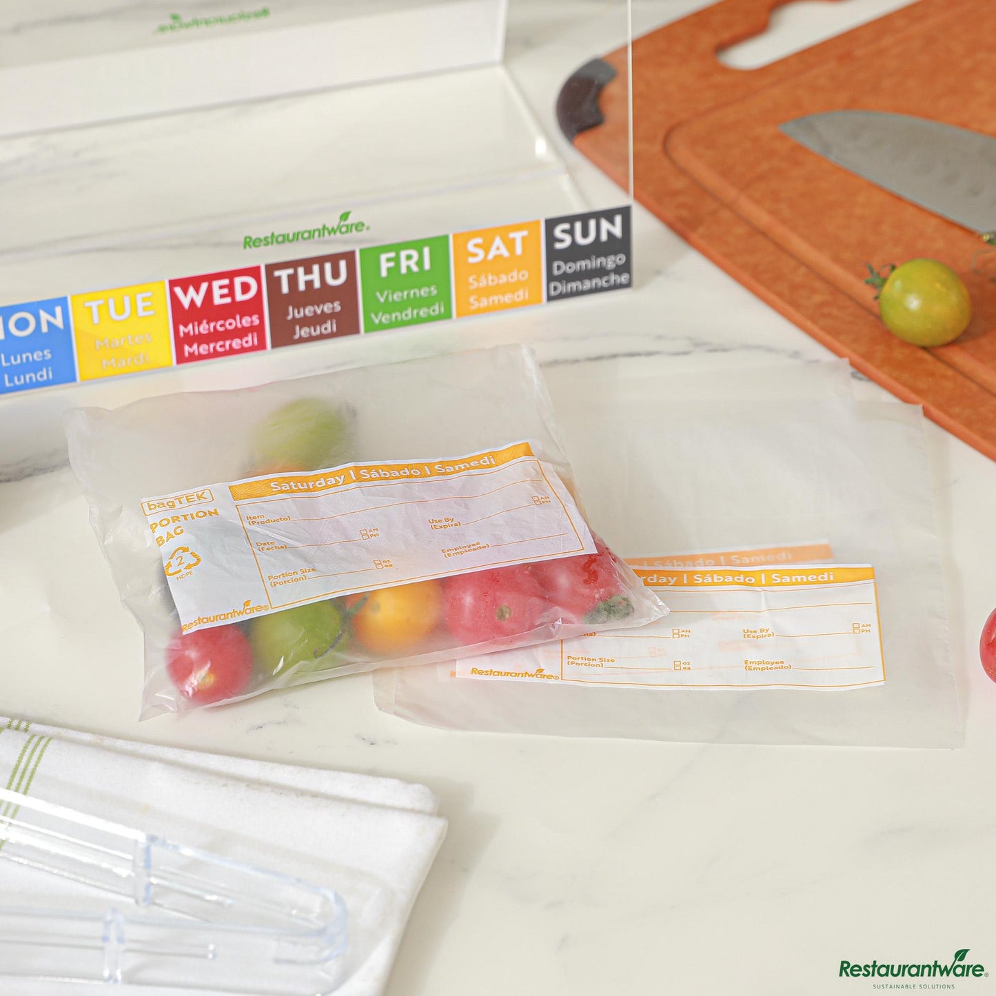 Wholesale Restaurantware Clear and Orange Plastic Day of the Week Saturday Portion Bag - 6.5"×7"×0.001"- Bulk