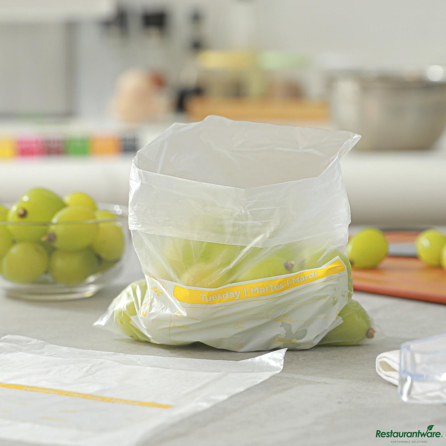 Wholesale Restaurantware Clear and Yellow Plastic Day of the Week Tuesday Portion Bag - 6.5"×7"×0.001"- Bulk