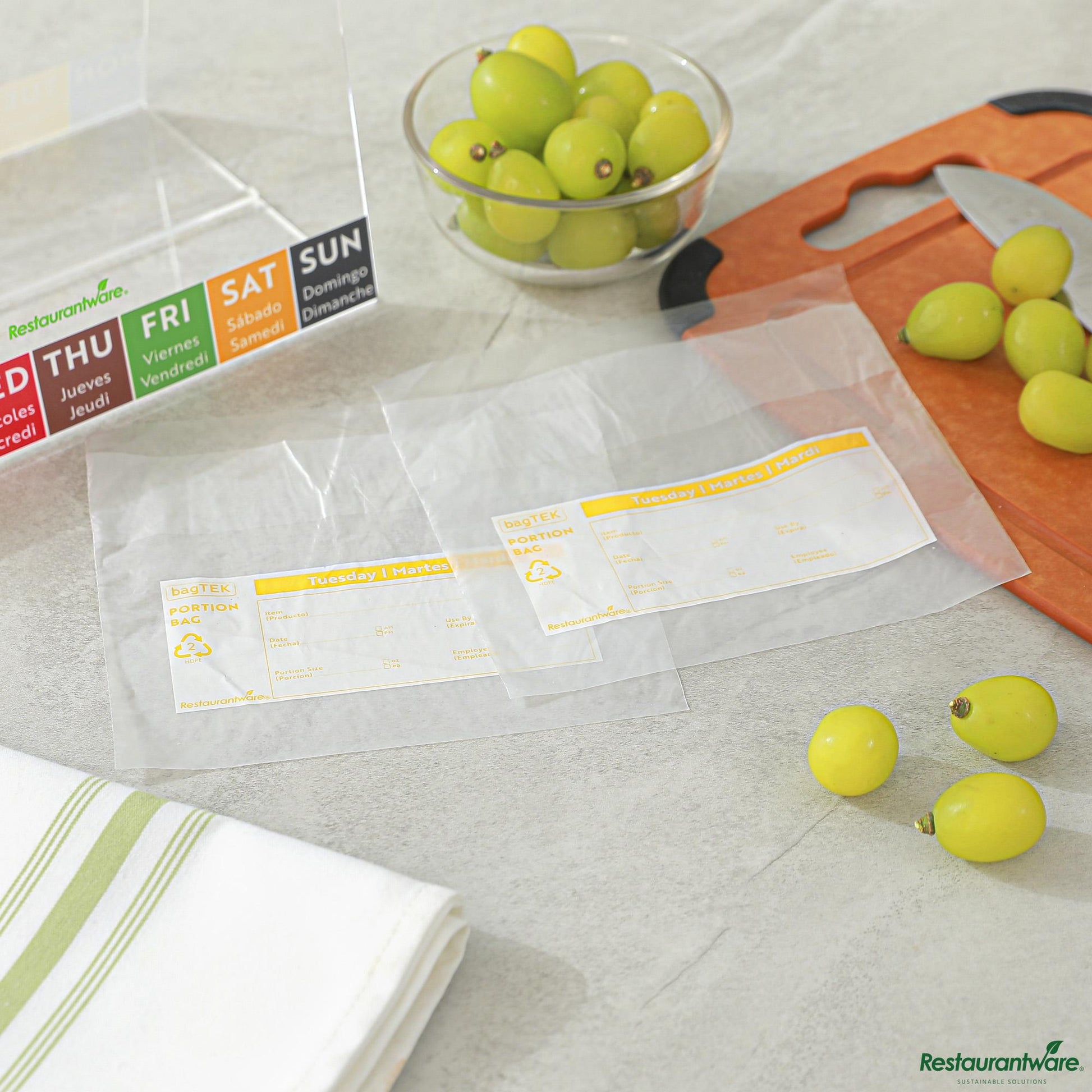 Wholesale Restaurantware Clear and Yellow Plastic Day of the Week Tuesday Portion Bag - 6.5"×7"×0.001"- Bulk