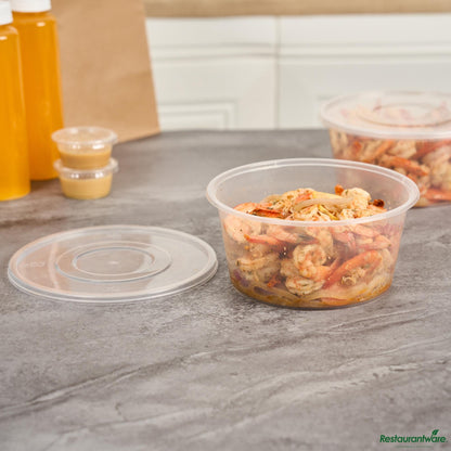 Restaurantware 68 Oz Round Clear Plastic Food Container - with Lid, Microwavable - 7.5"×7.5"×4.3"