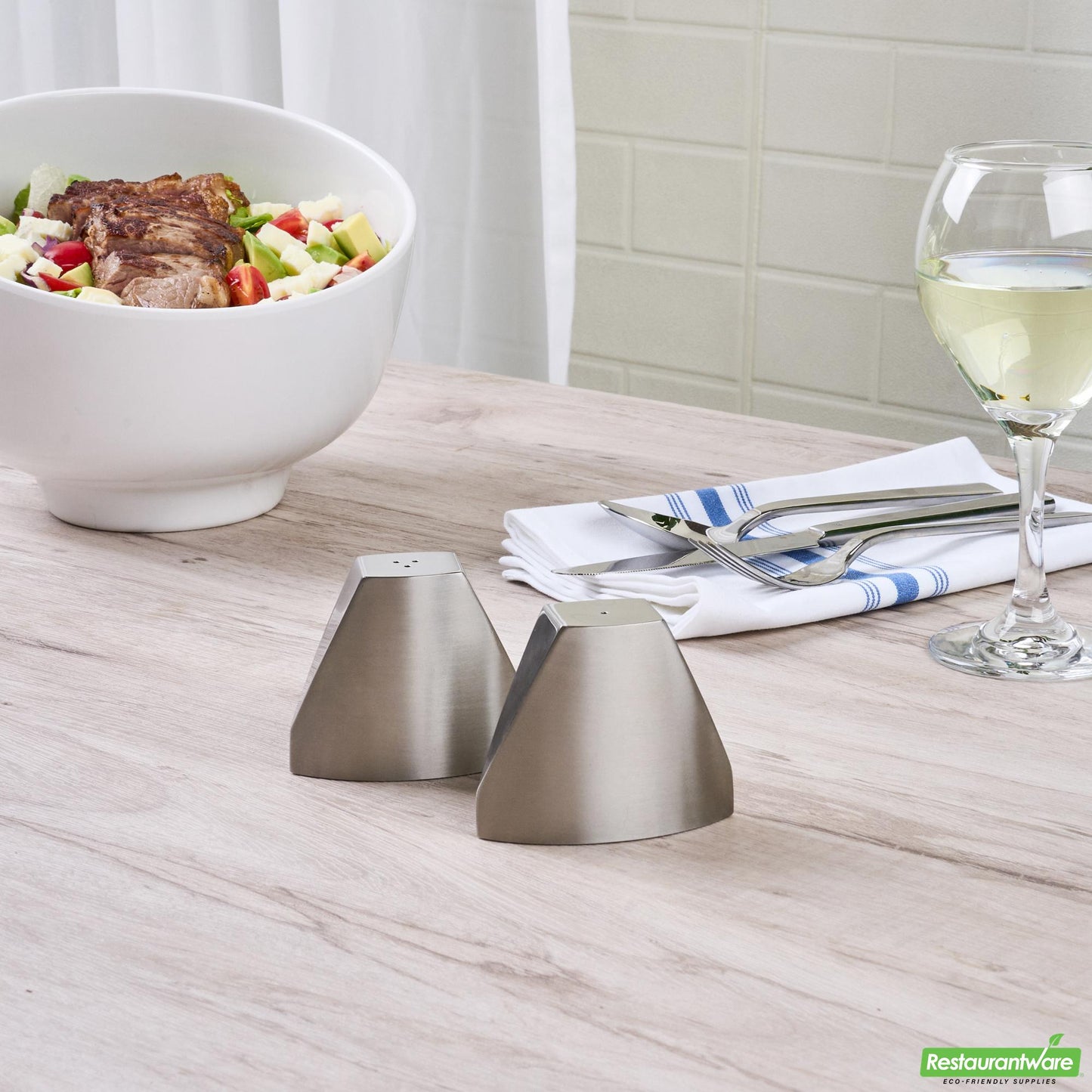 Wholesale Restaurantware 3 Oz Silver Stainless Steel Wedge Salt and Pepper Shaker Set - 3 1/4" X 1" X 2 3/4"- Bulk