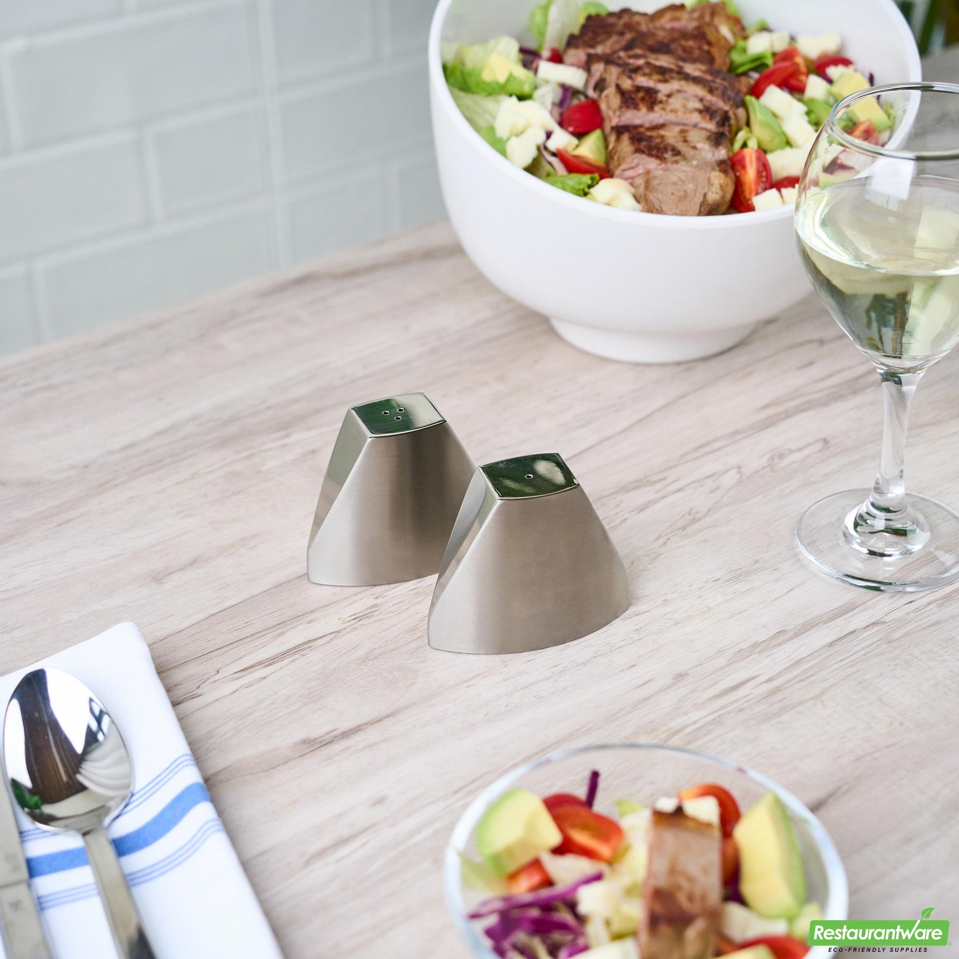 Wholesale Restaurantware 3 Oz Silver Stainless Steel Wedge Salt and Pepper Shaker Set - 3 1/4" X 1" X 2 3/4"- Bulk