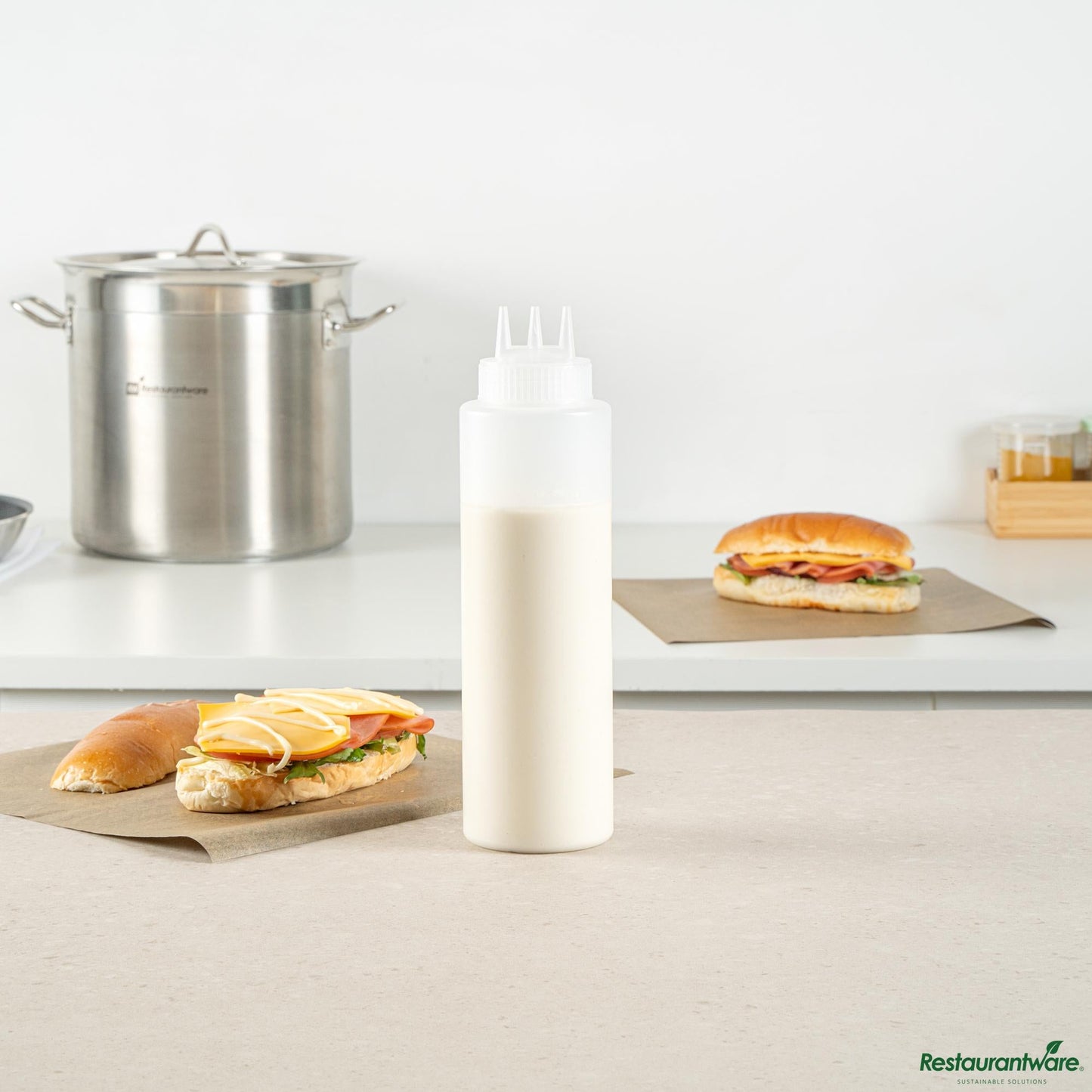 Wholesale Restaurantware 32 Oz Clear Plastic All-Purpose Squeeze Bottle - Triple Dispersion Tip - 3.1" X 3.1" X 10.8"- Bulk