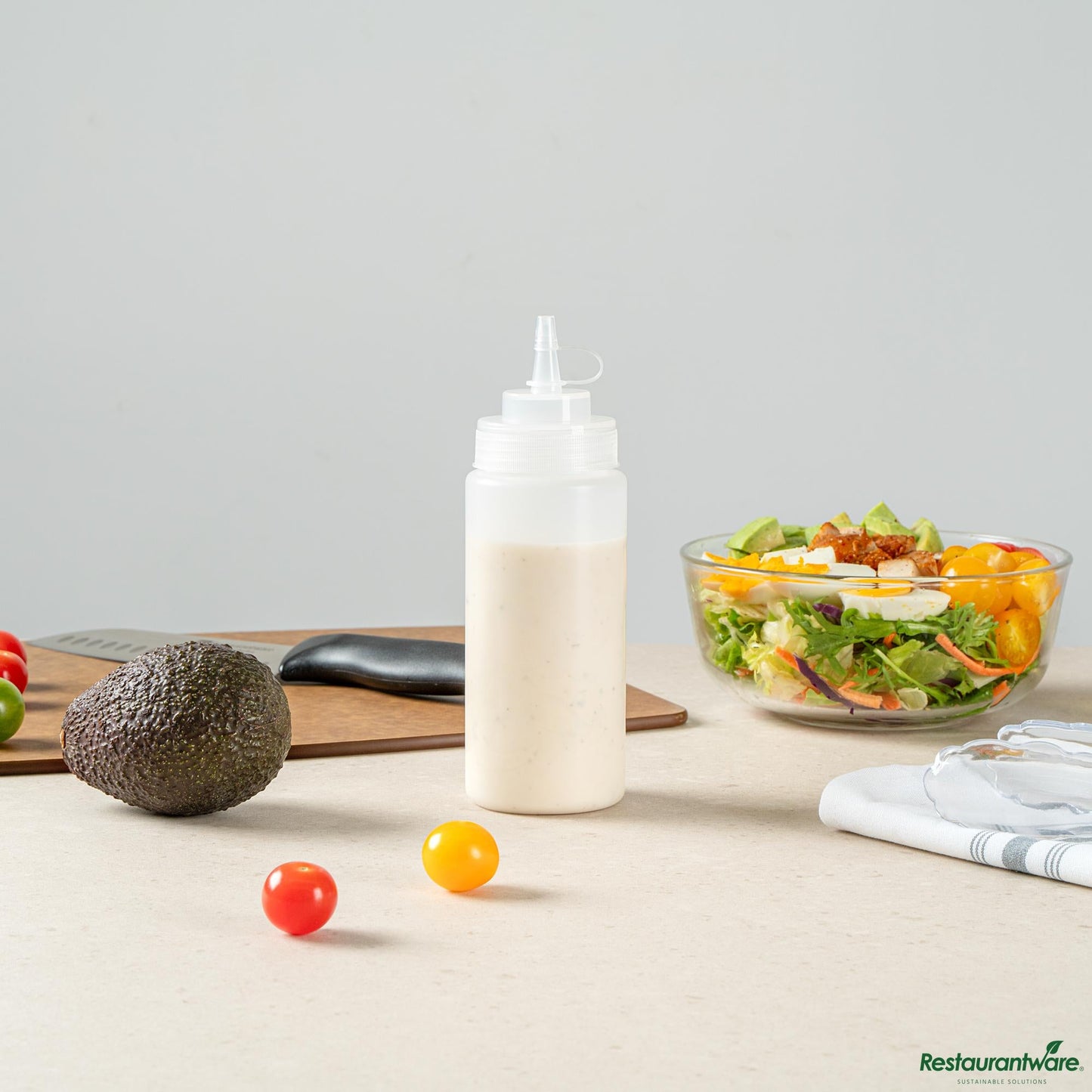 Wholesale Restaurantware 16 Oz Clear Plastic Squeeze Bottle - with Cap, Wide Mouth - 2.6" X 2.6" X 7.9"- Bulk
