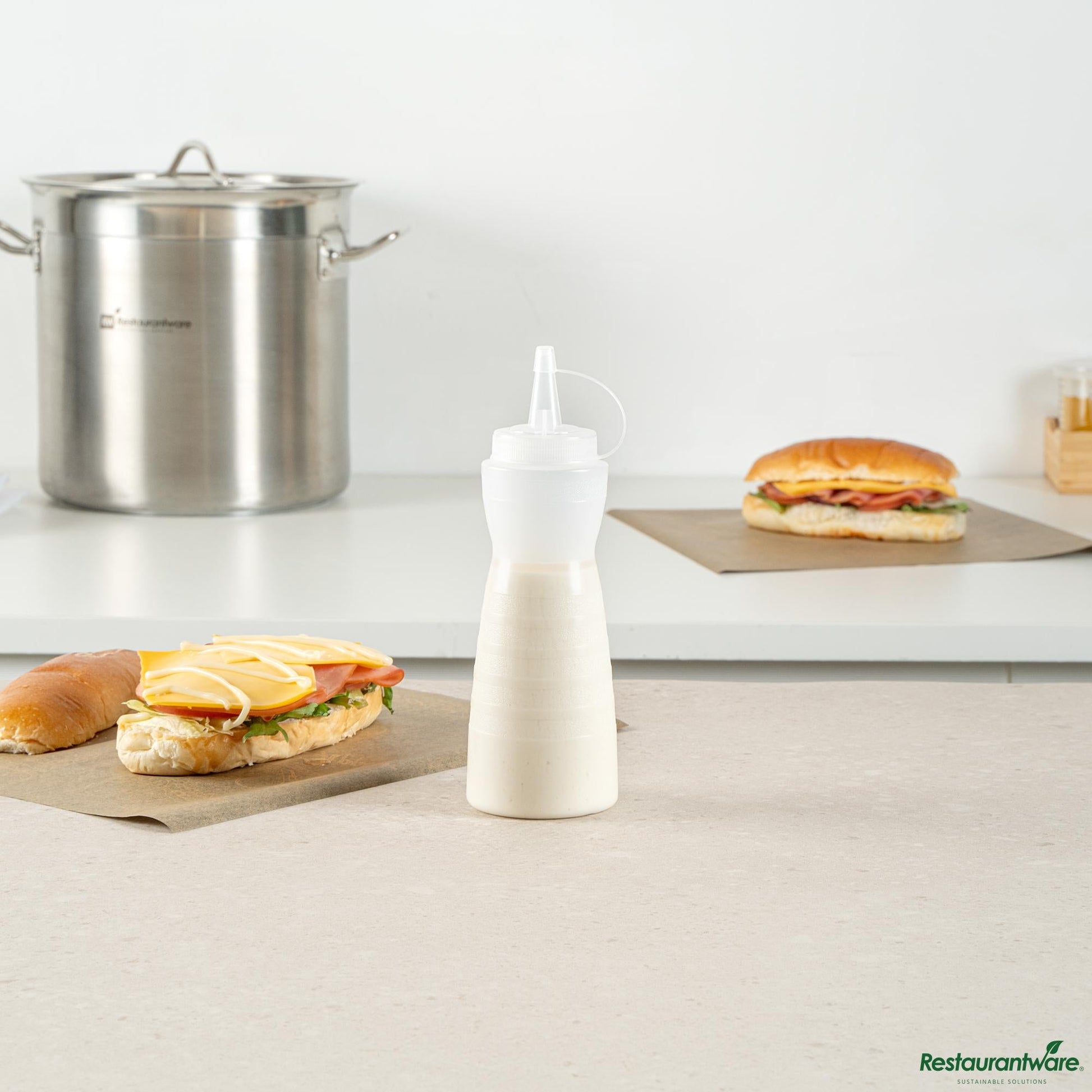 Wholesale Restaurantware 12 Oz Gourd-Shaped Clear Plastic Squeeze Bottle - with Cap, Wide Mouth - 2.4" X 2.4" X 7.9"- Bulk