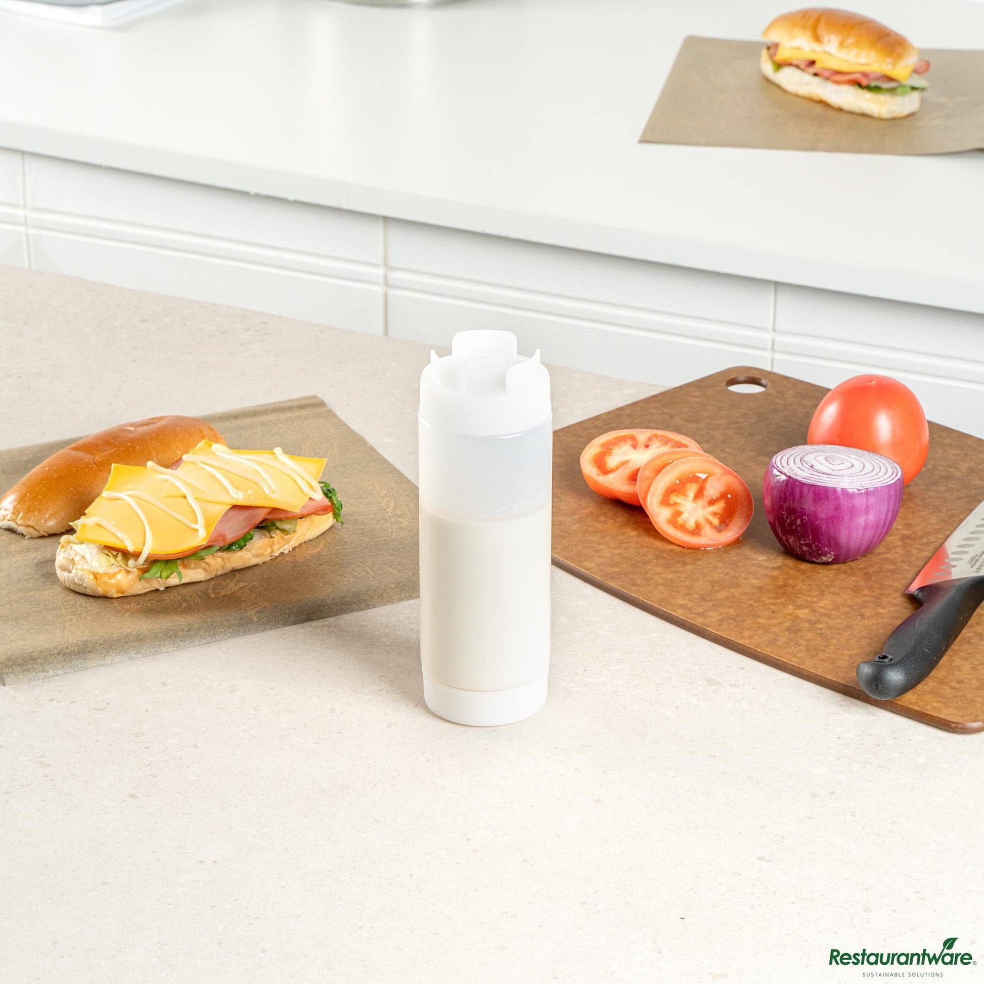 Wholesale Restaurantware 20 Oz Clear Plastic Squeeze Bottle - Inverted, Refill & Dispensing Lid - 2.7" X 2.7" X 7.9"- Bulk