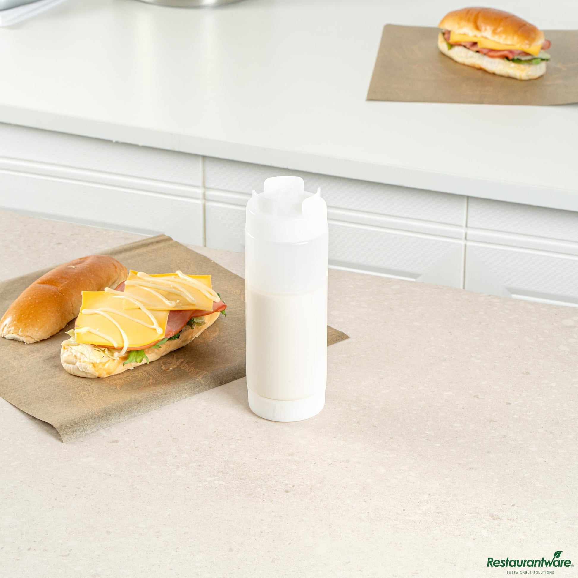 Wholesale Restaurantware 20 Oz Clear Plastic Squeeze Bottle - Inverted, Refill & Dispensing Lid - 2.7" X 2.7" X 7.9"- Bulk