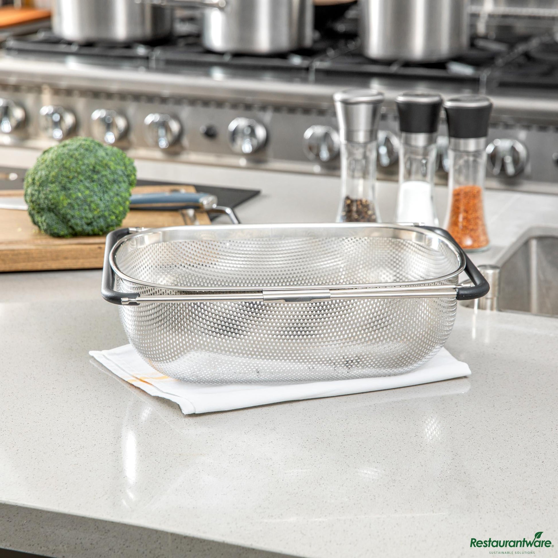 Wholesale Restaurantware 6 Qt Stainless Steel over-the-Sink Colander - Expandable Handles - 14.6" X 10.4" X 4.5"- Bulk