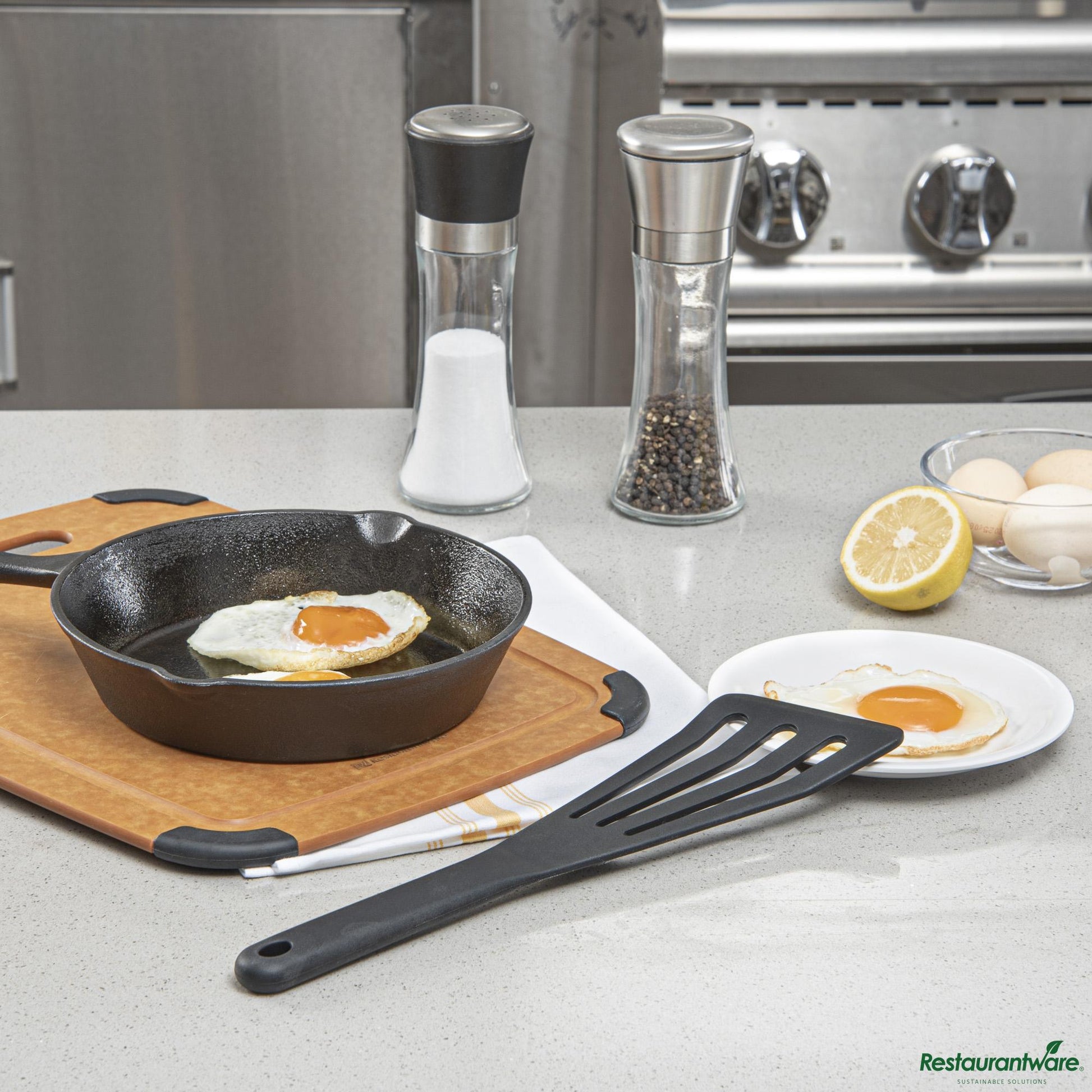 Wholesale Restaurantware Black Silicone High Temperature Slotted Turner / Spatula - 12.3" X 3.5" X 0.5"- Bulk