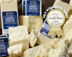 Wholesale 7Yr Quebec White Cheddar 8 Oz- Bulk