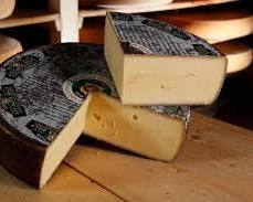 Wholesale Affineur Walo Red Nose Hard Cheese (One Eighth Wheel, 8.5 LB) - Aged with Red Wine for a Strong, Spicy Finish- Bulk