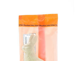 Wholesale Madelaine Chocolate 6 Oz. White Chocolate Sitting Rabbit Cello Bag (5¾") (2 Displayers)- Bulk