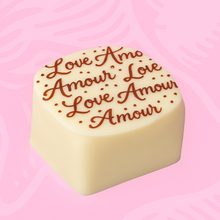 Wholesale Nirvana Bulk Case: White Chocolates with Red "Amour" Stencil and Crunchy Praline Filling (Approximately 60 Pieces) 0.59 OZ- Bulk