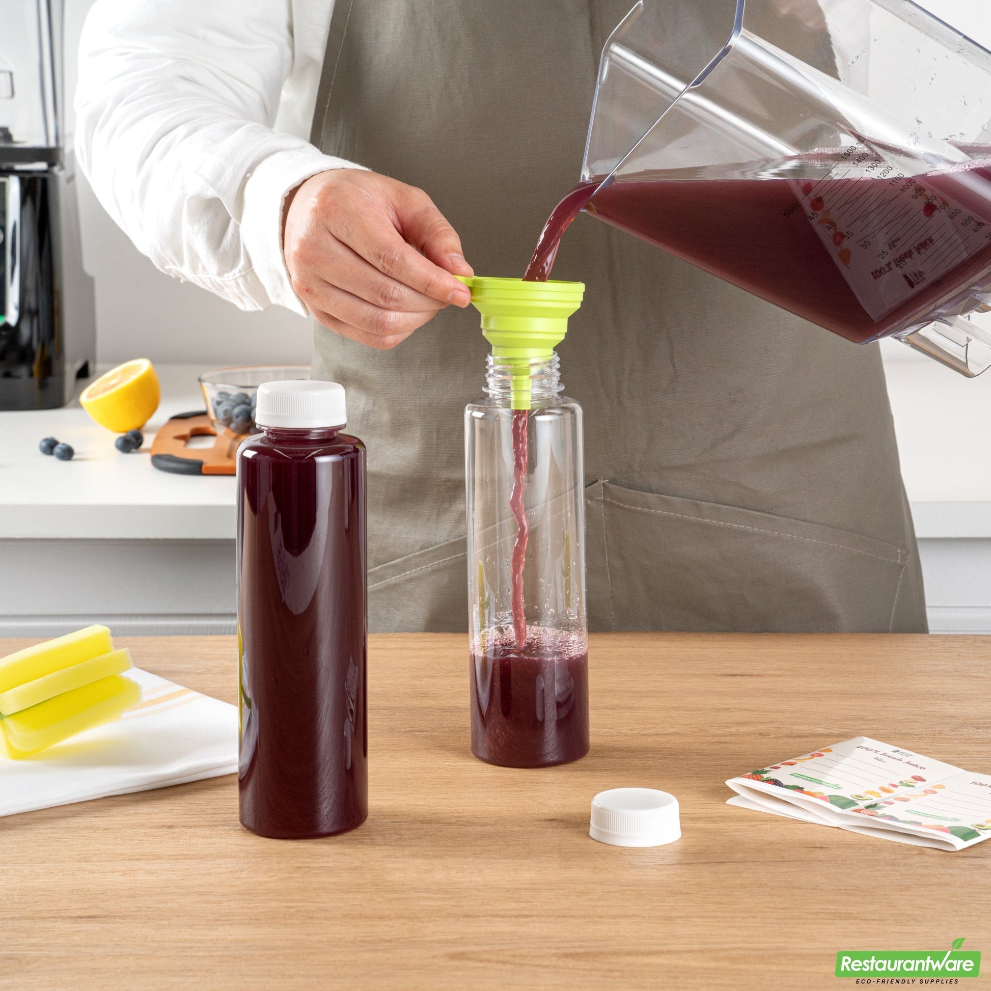 Wholesale Restaurantware Bottle Tek 100 Round Clear 16 oz Plastic Juice Bottles with Safety Caps- Bulk