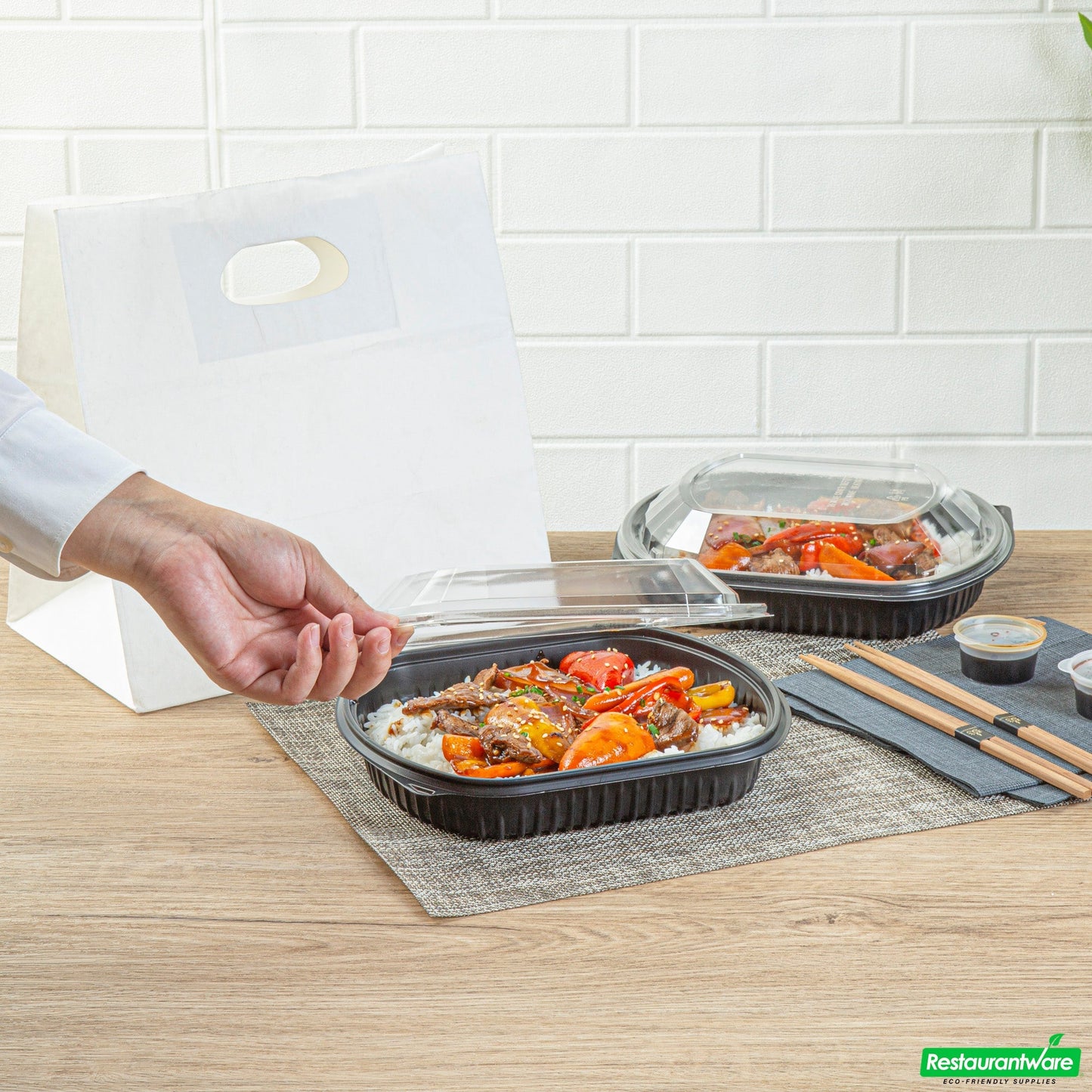 Wholesale Restaurantware 36 Oz Rectangle Black Plastic Food Container - with Clear Lid, Microwavable - 9 1/4" X 7 3/4" X 2 3/4" - 50 Count Box- Bulk